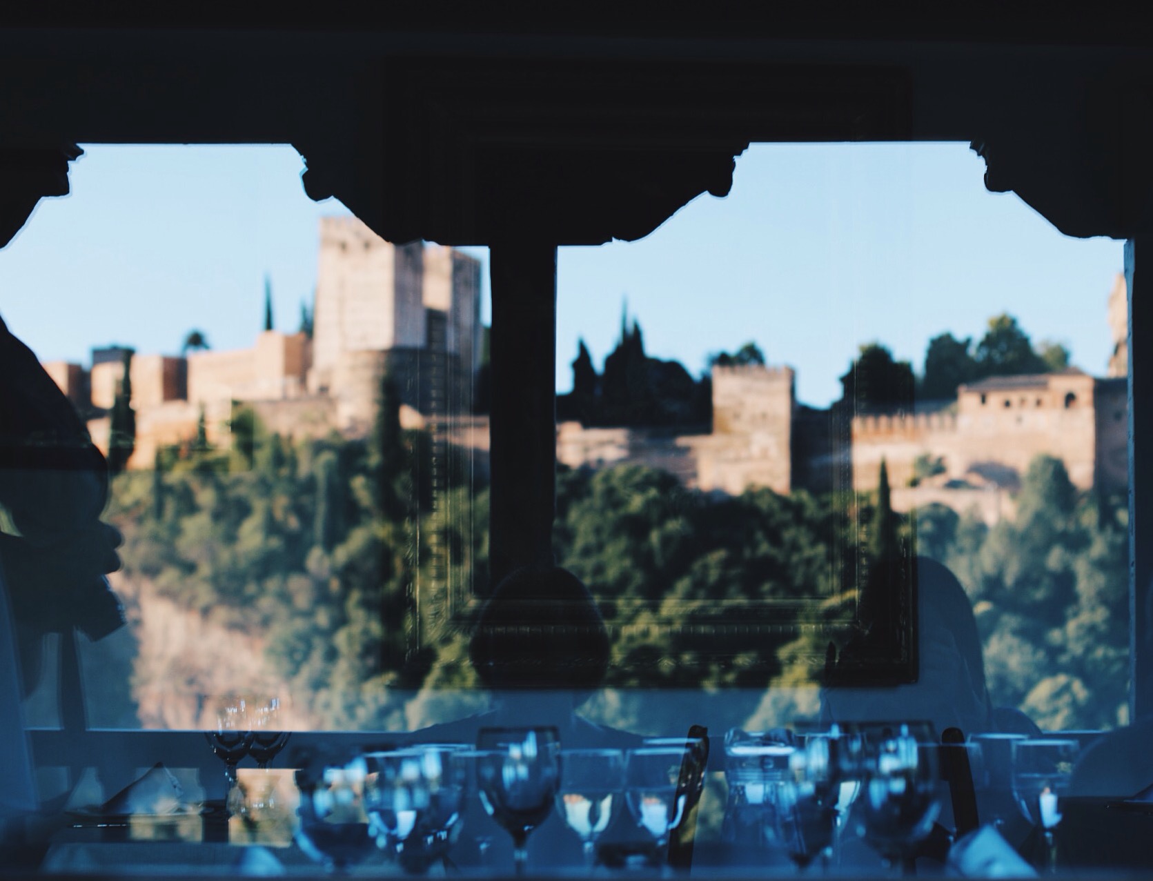 VIEWS REFLECTED FROM THE DINING ROOM BEHIND THE MORAYMA BALCONY