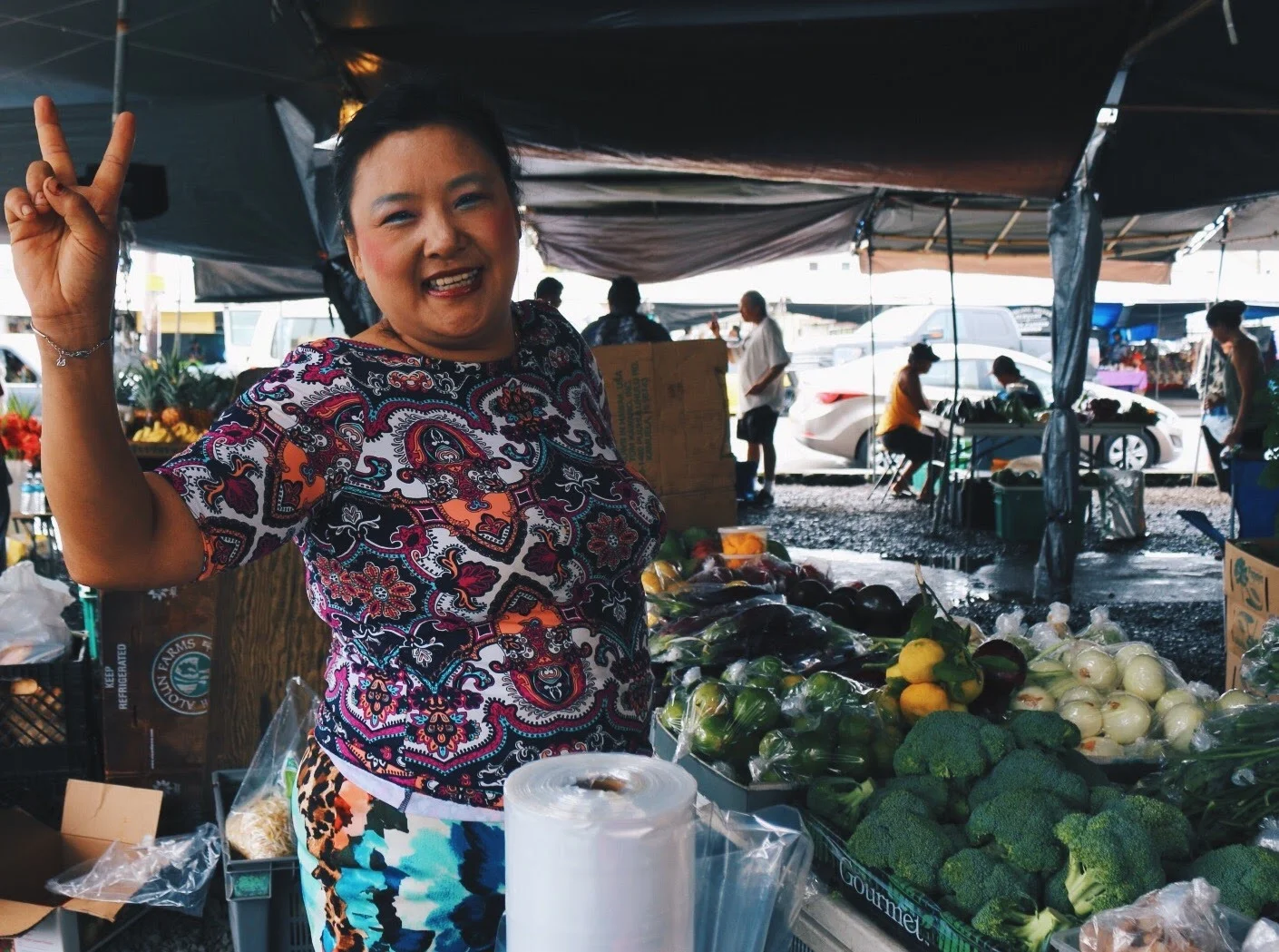 SMILES ABOUND AT HILO FARMERS MARKET.