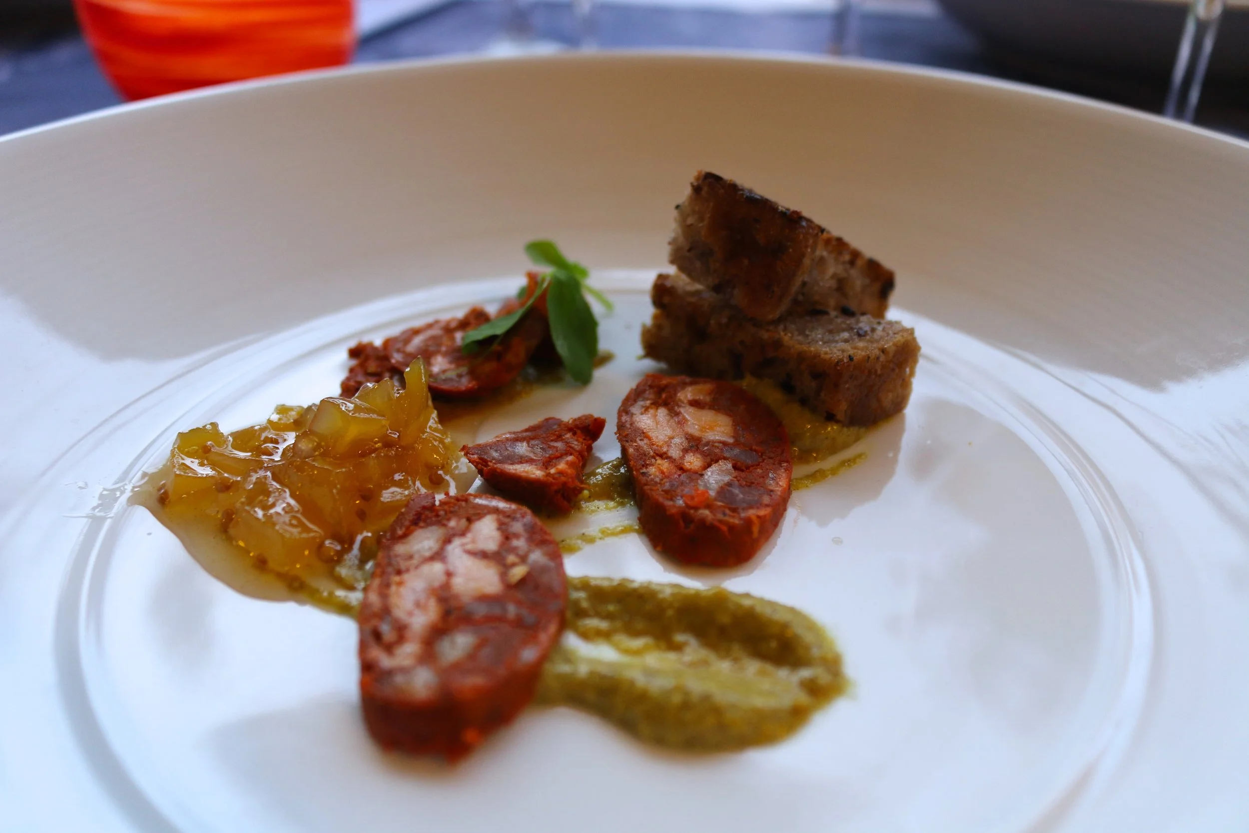 WILD BOAR CHORIZO AND OLIVE WALNUT CROUTON WITH HOUSE MUSTARD AND GREEN MANGO JAM