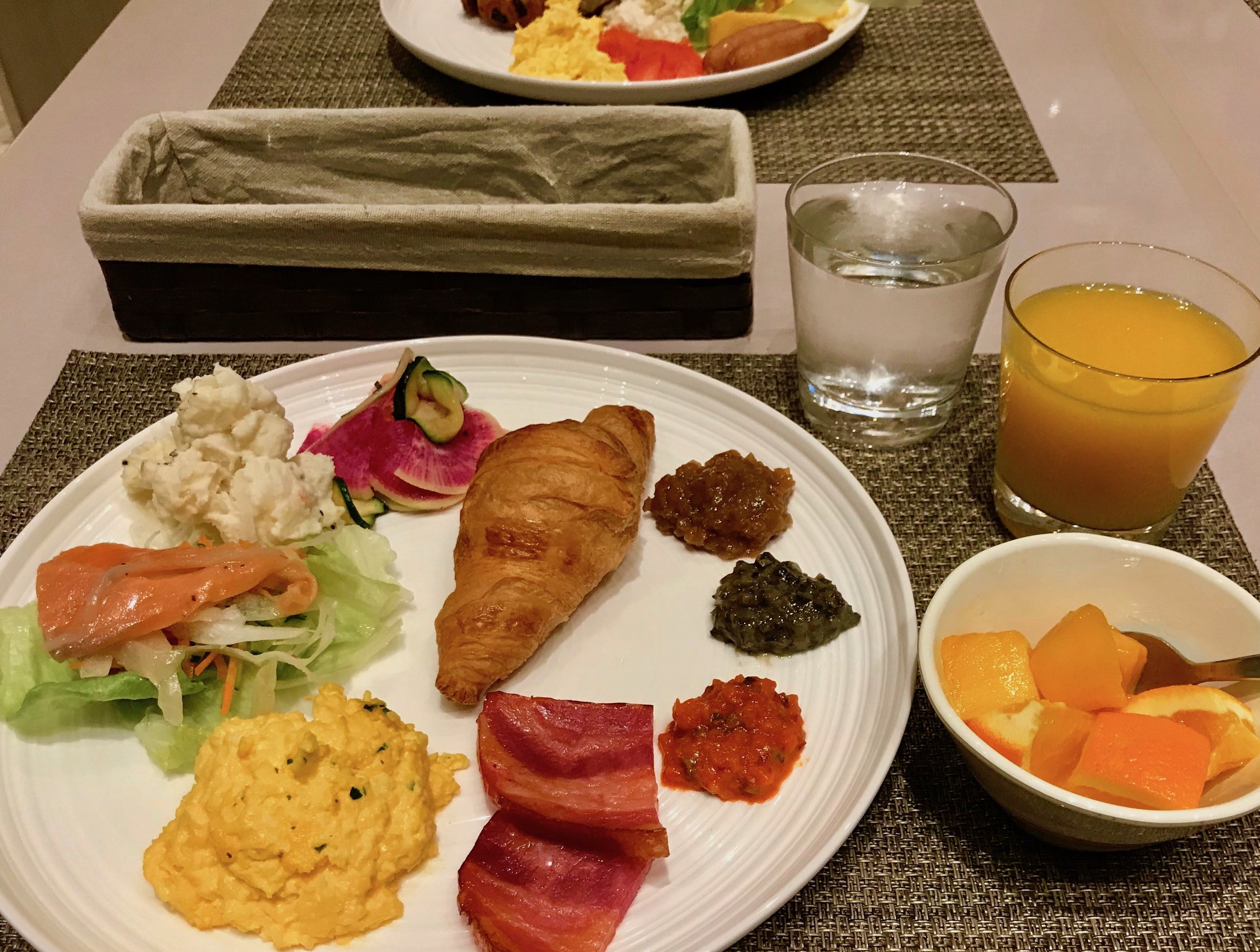 My breakfast pickings - smoked salmon salad, potato salad, pickled rainbow radish and cucumber salad, bacon, and scrambled eggs
