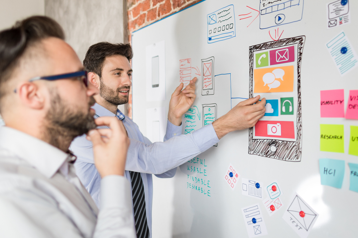 Designers-drawing-website-ux-app-development.-853580922_1258x839.jpeg
