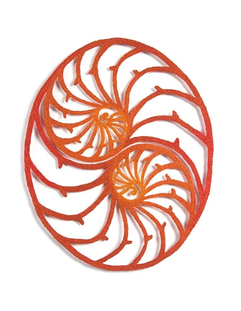 The artwork and the jewellery it inspired. 

My embroidered artwork &lsquo;Nautilus Unity&rsquo; (2018) is inspired by the internal structure of a Nautilus shell and its mathematical perfection. 

It has now been lovingly reinterpreted in precious me