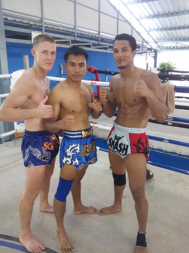 At Taling Ngam gym with Head trainer Meechai And fighter/trainer Kriss.