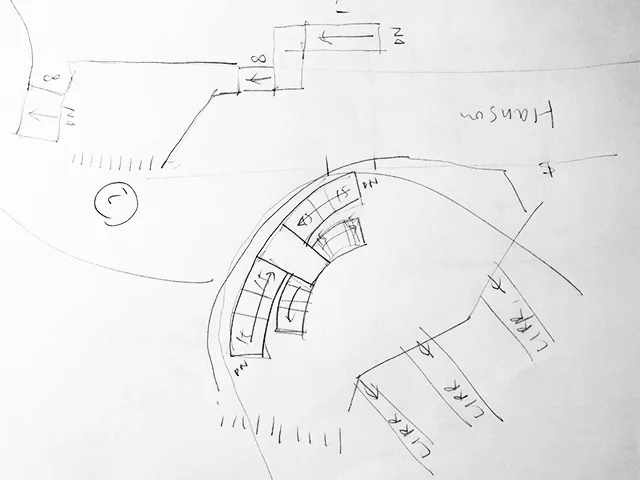 Curved stair case following the shape of the corner building on Hanson Pl x Flatbush