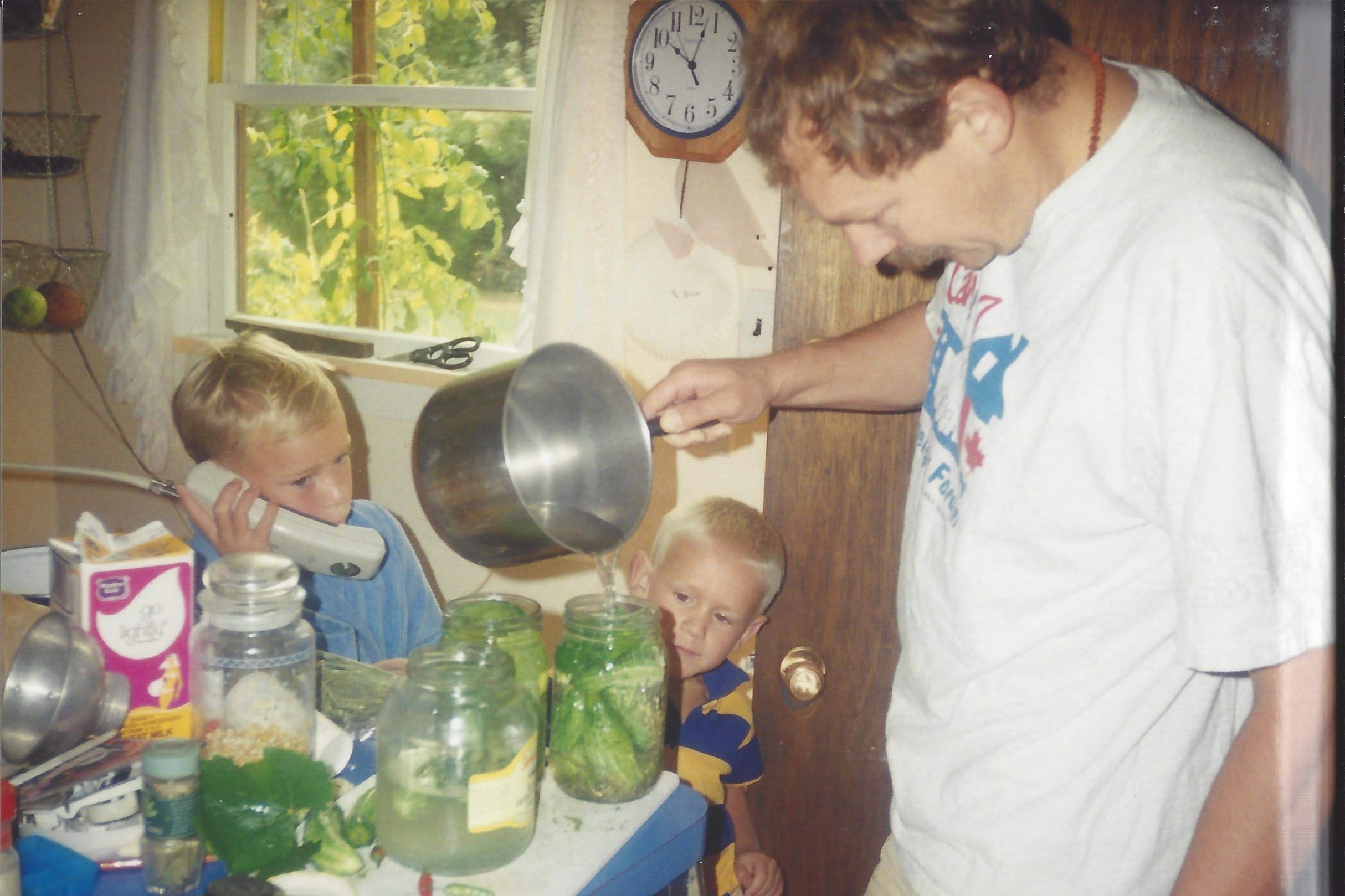 Ken making pickles with his sons