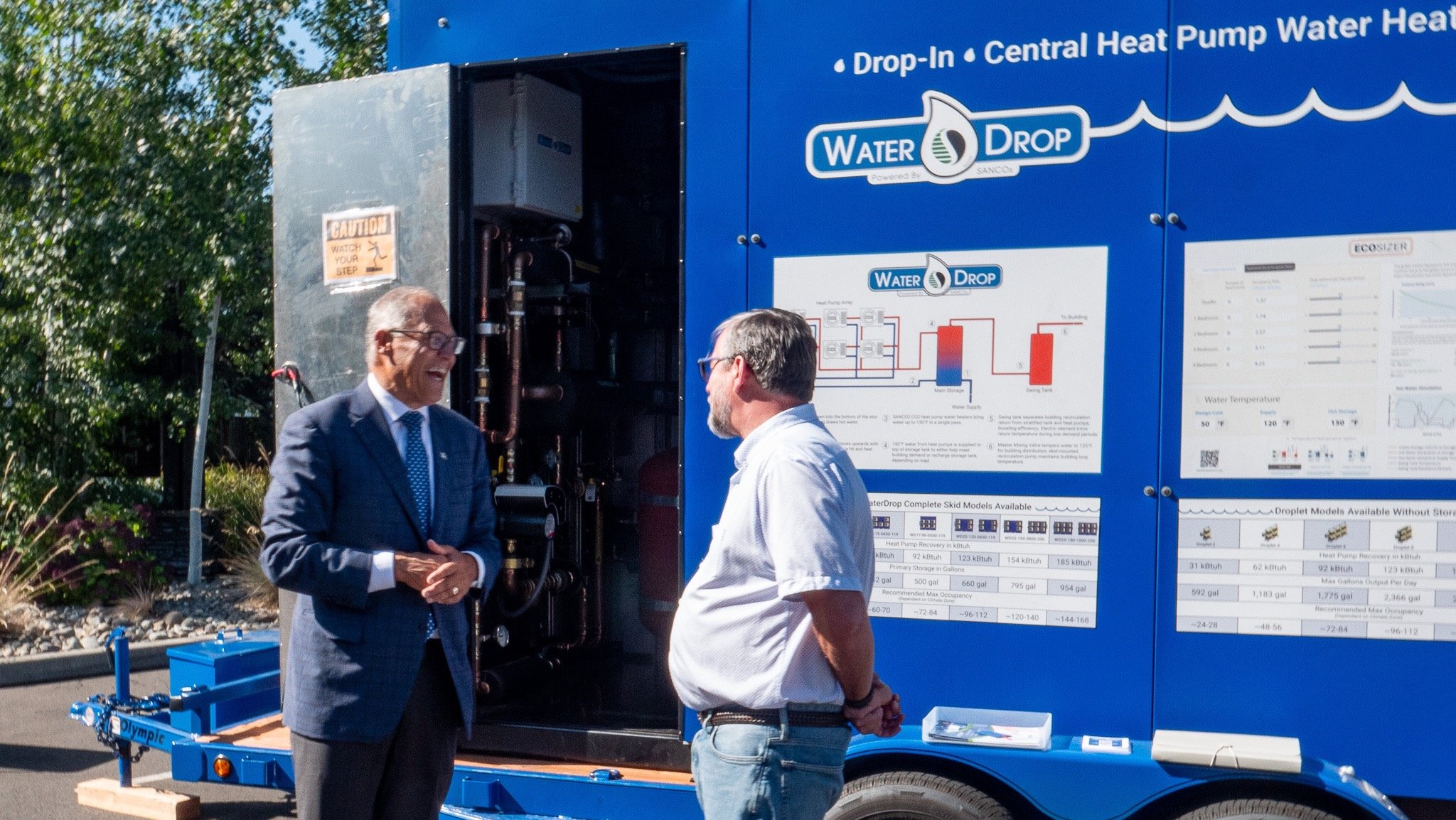 Governor Inslee &amp; Albert Rooks in front of WaterDrop  skid