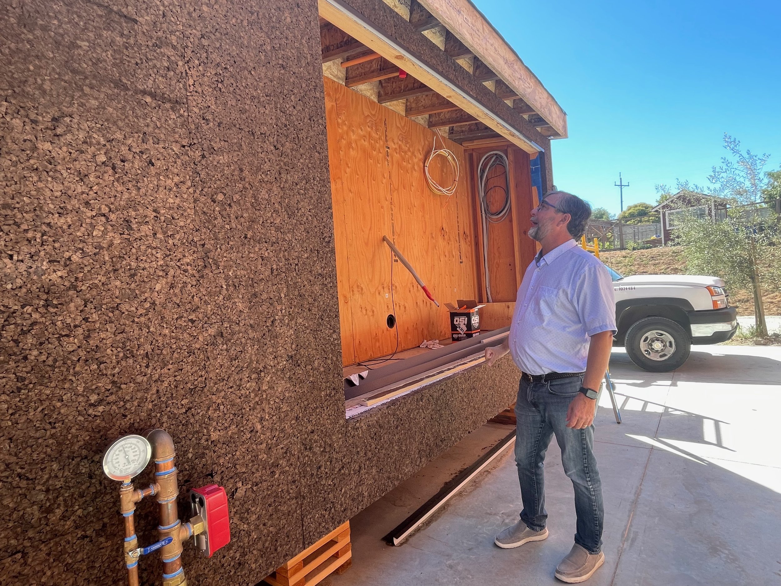 Albert Rooks looks at the ThermaCork exterior.