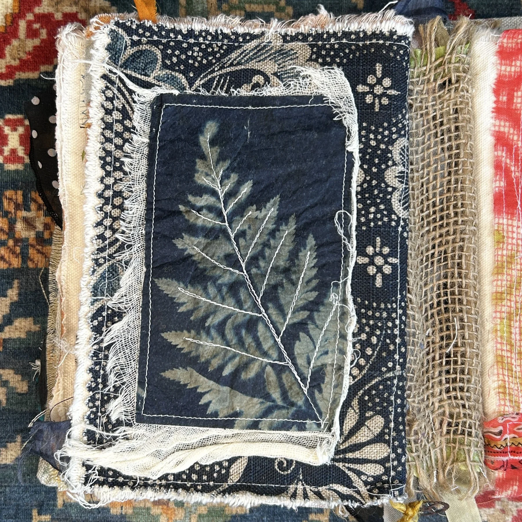 Journal page with cyanotype process using a fern as a mask