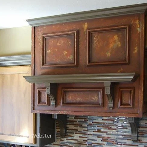 Kitchen hood with decorative paint finish