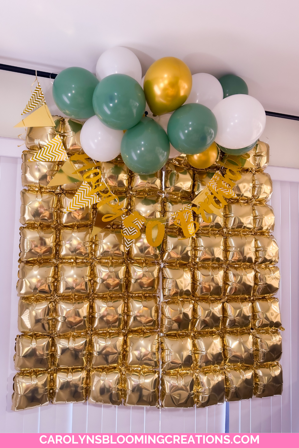 Gold Balloon Backdrop for a 50th Birthday Party