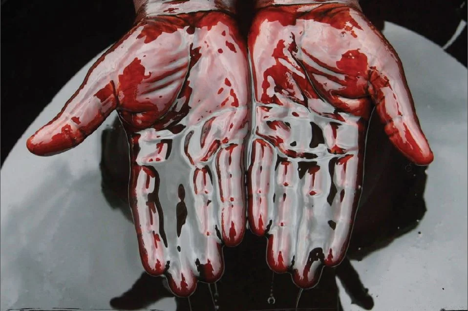 BloodOilCoverHands.JPG