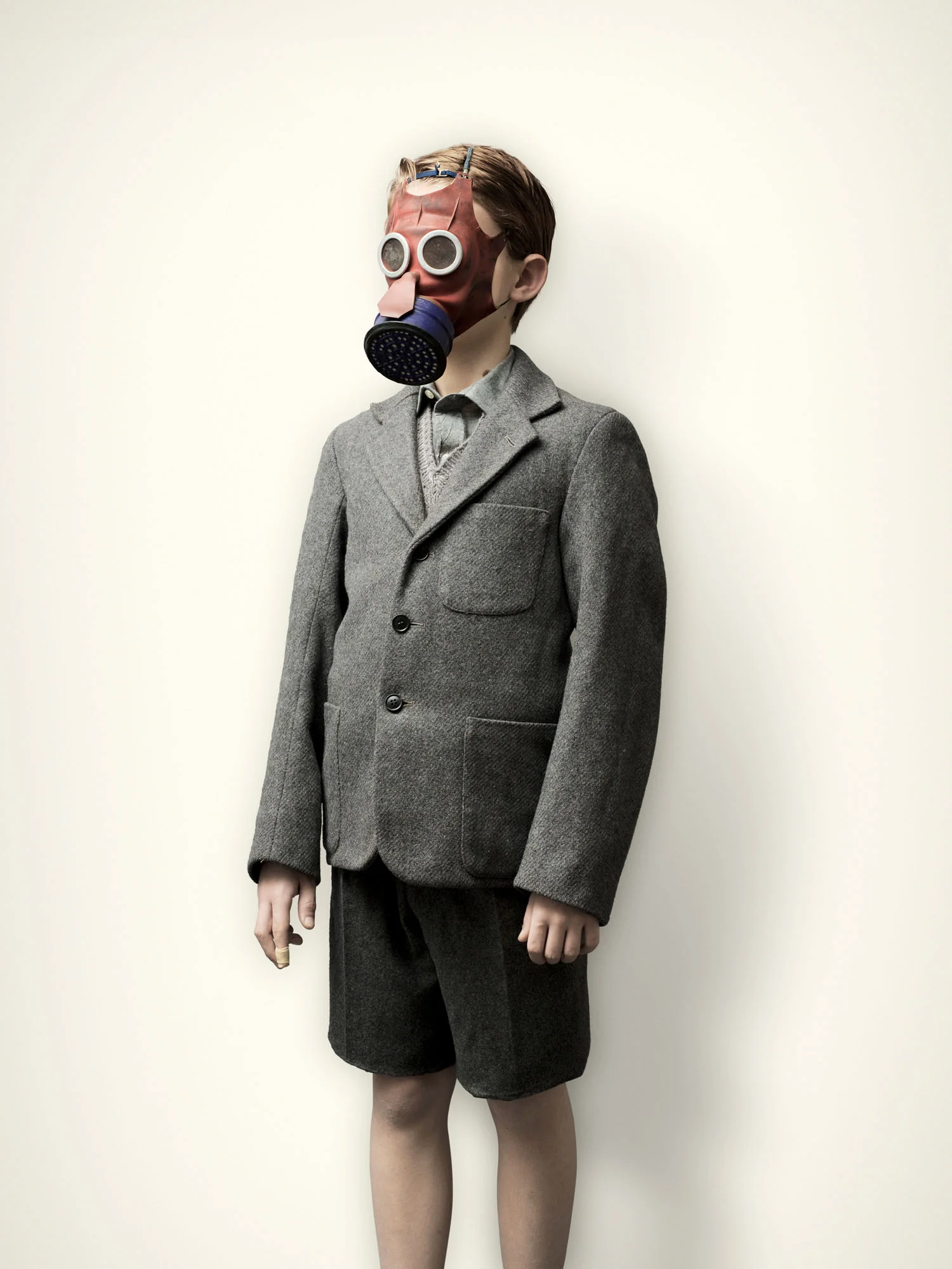 Evacuee with Micky Mouse Gas Mask (2008)