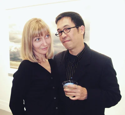 A photograph of Debra Klomp Ching and Darren Ching in Photograph magazine.