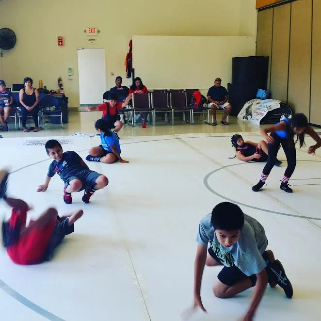 Just like gymnasts, wrestlers learn tumbling so they can fall without getting hurt and roll, and bounce back to their feet using technique.