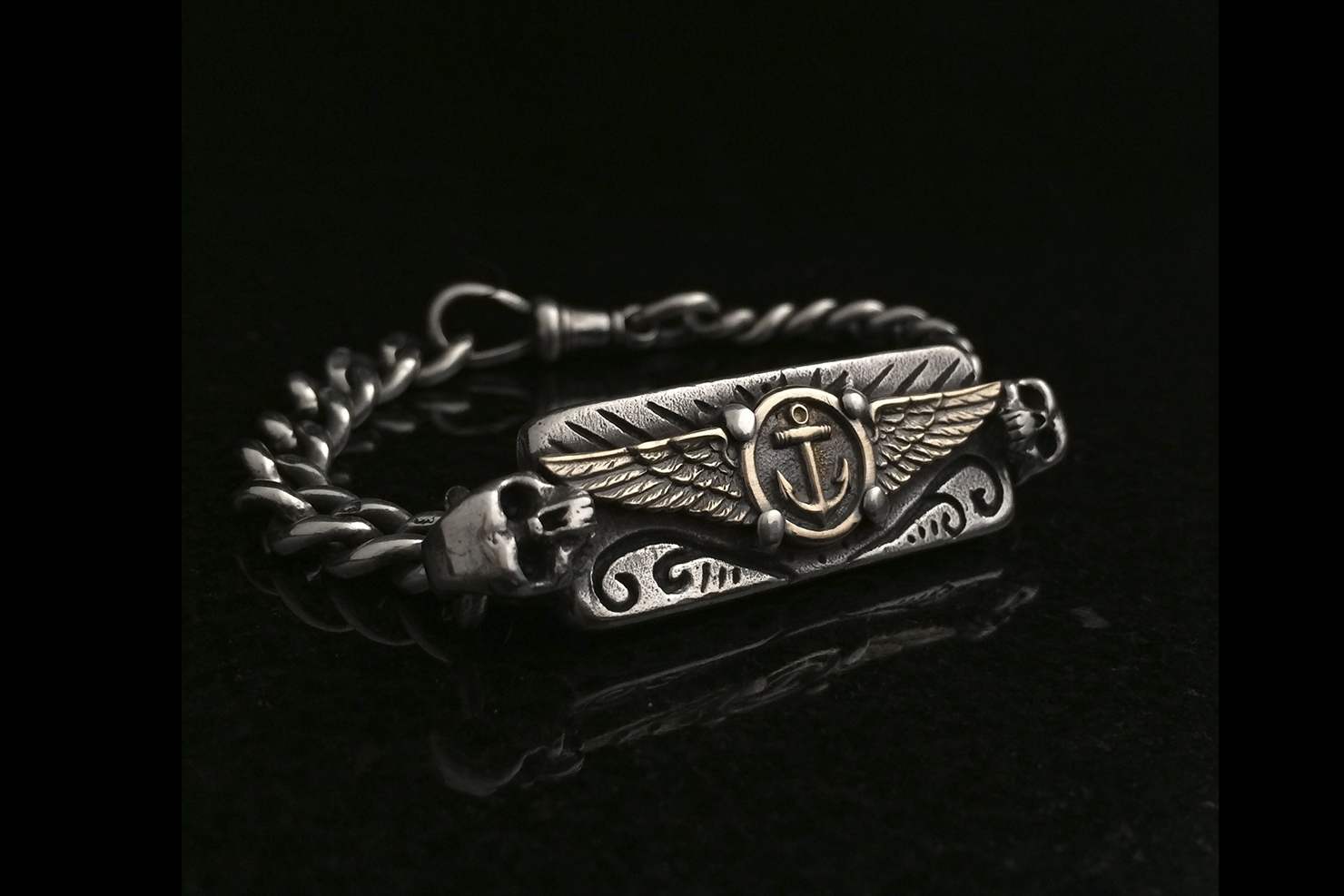 anchor wings bracelet.jpg