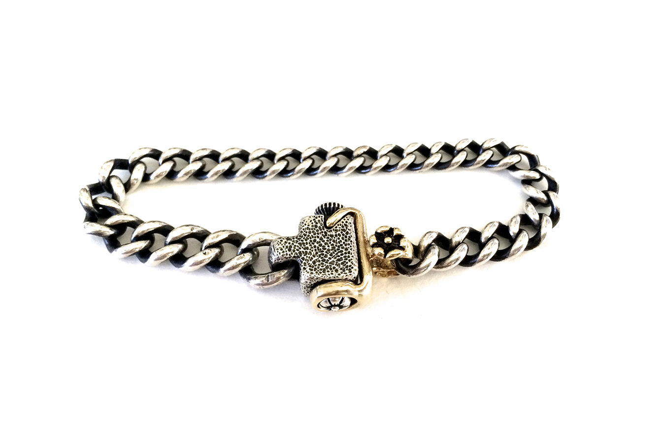 silver bracelet w gold clasp.jpg