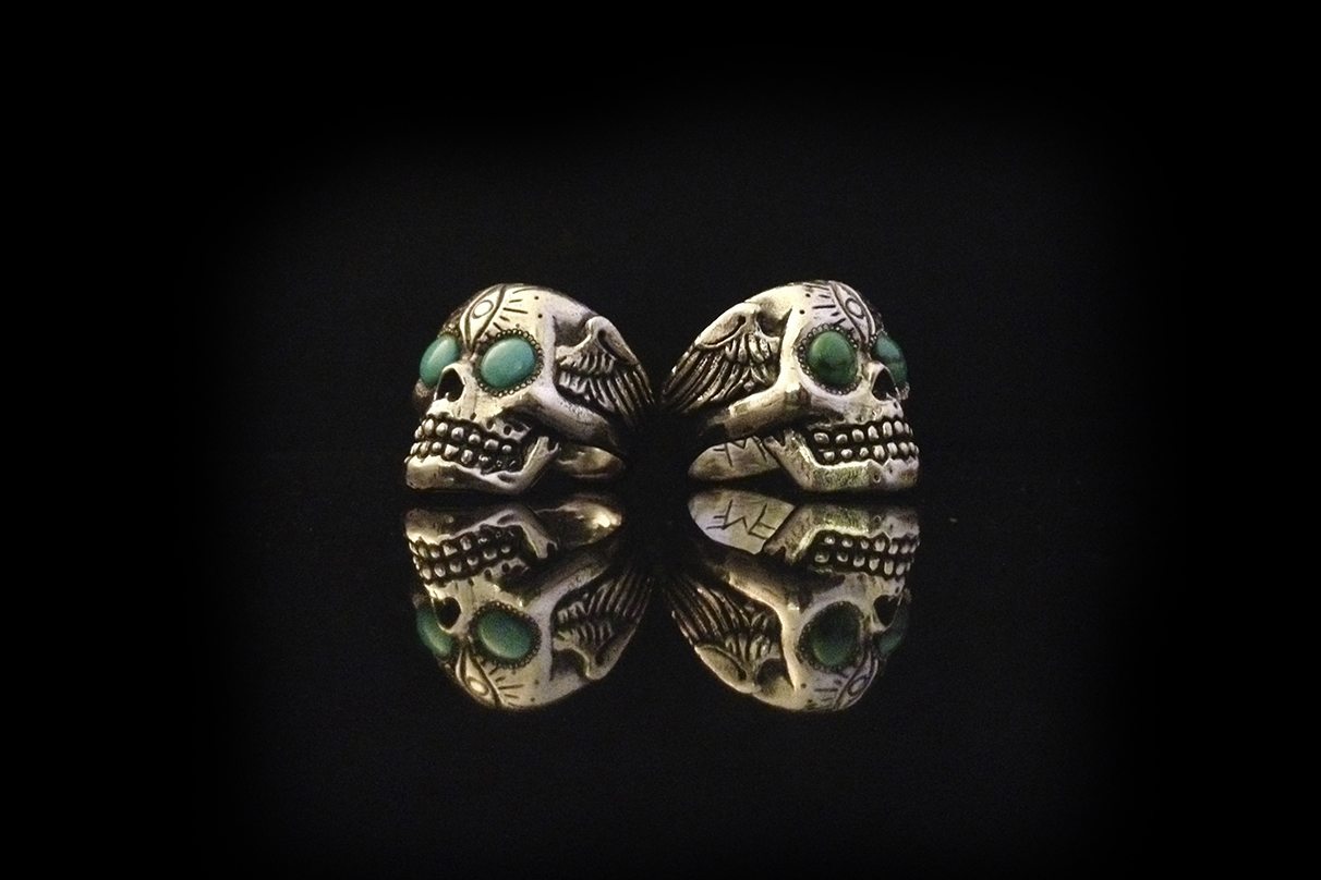 turquoise eyes skull rings.jpg