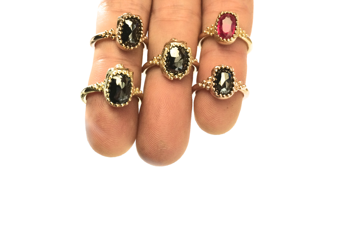 skull rings on three fingers.jpg