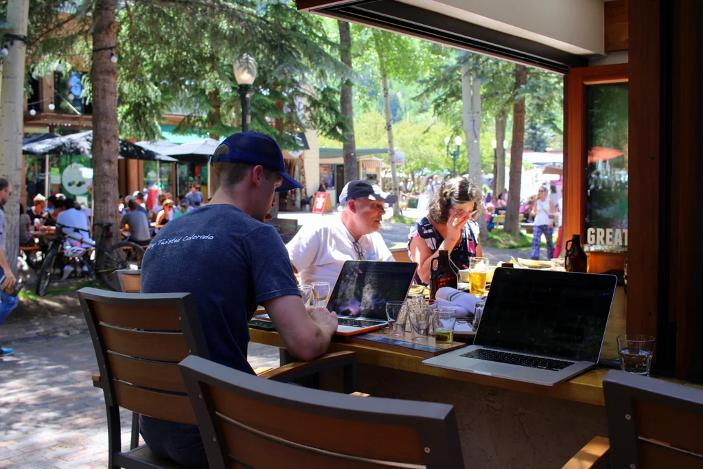 Catching up over beers and catching up on work.