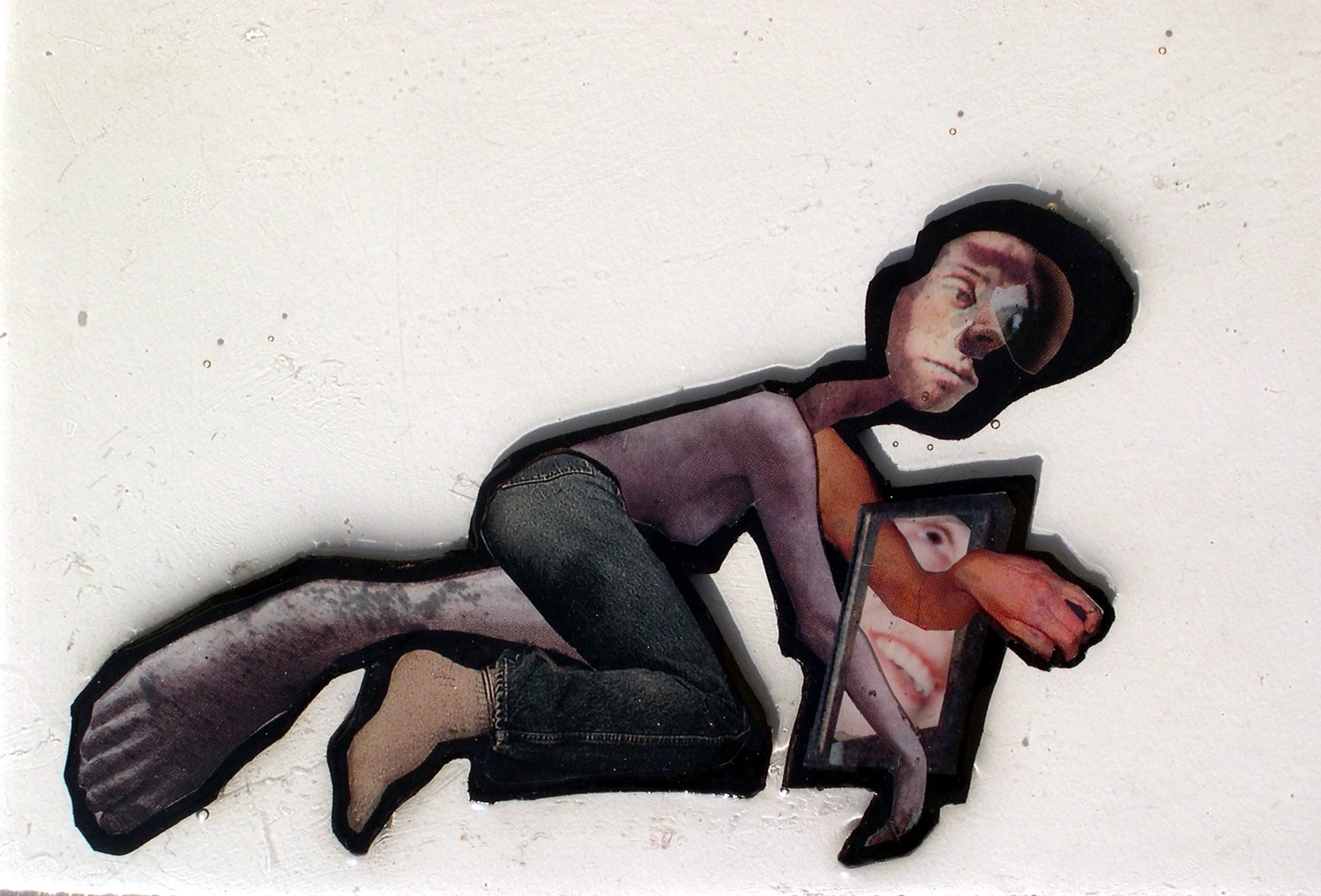 Stuck In It, 2005, Found photographs and appropriated printed materials cast in plastic resin. 8.25” X 5.25”