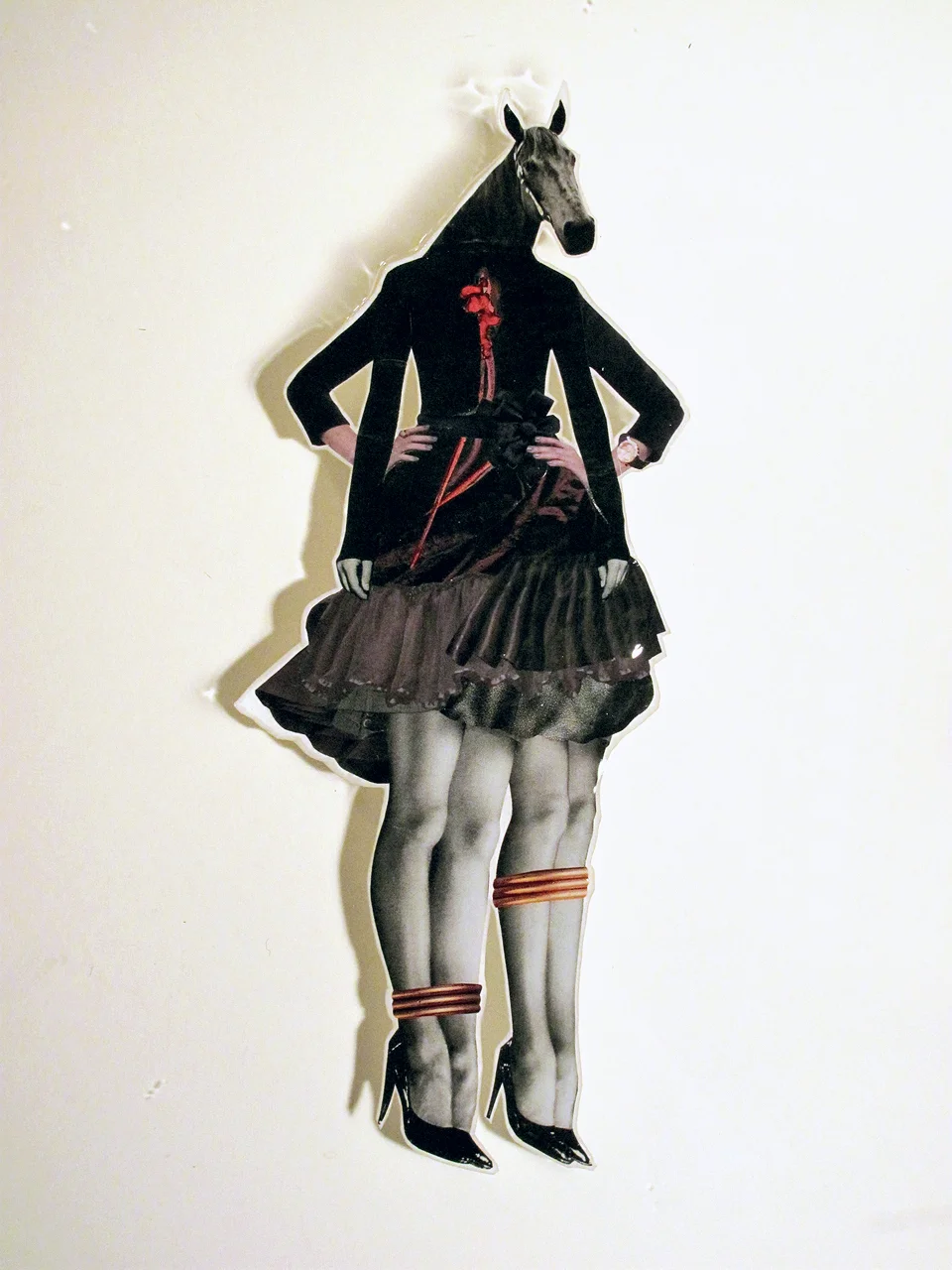 Work Horse , 2011, Hand-cut and assembled photographs and found images, cast in plastic resin. Framed. 16 x 20"