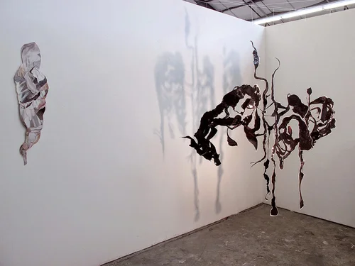 For Leonora (installation) , 2013, Hand cut/assembled found images, paper, cast plastic resin, metal wire, acrylic wire, shadow. 3 parts. 64 X 24 X 64”