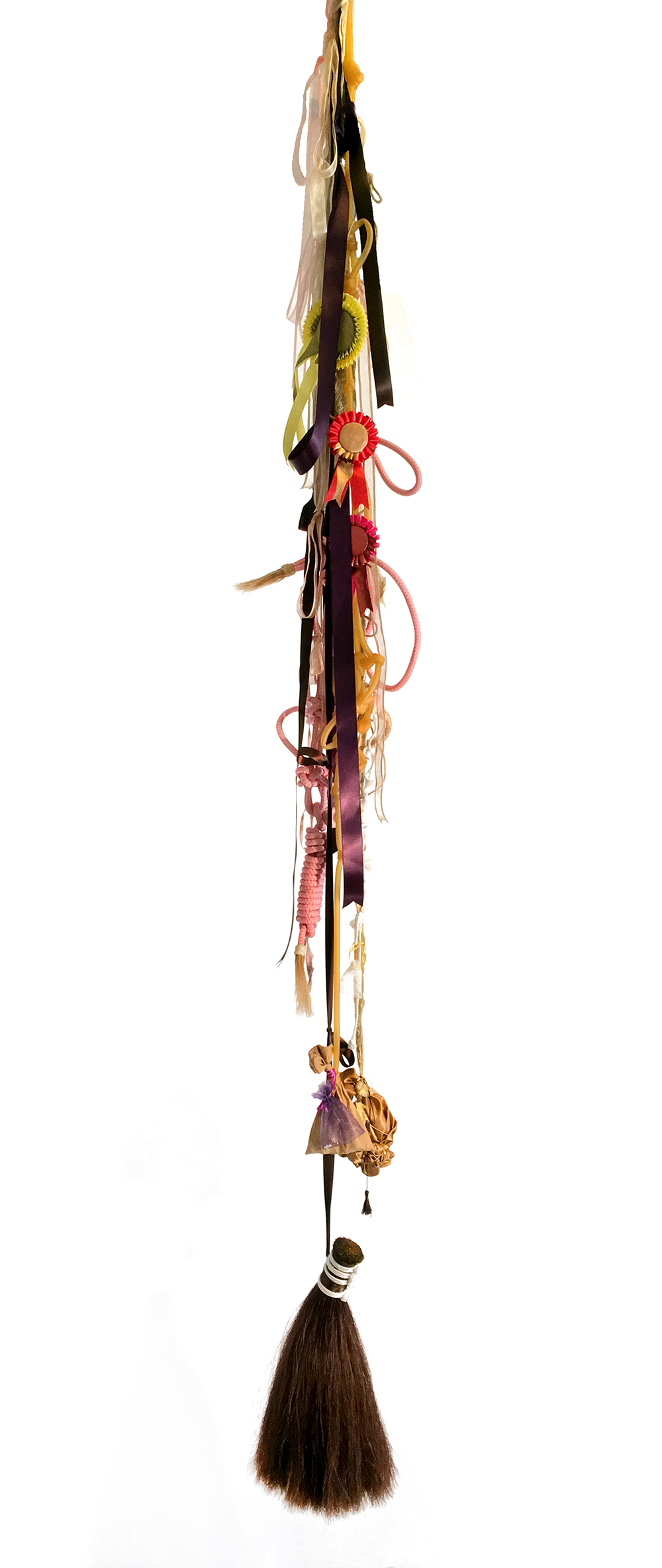   Trophy,  2017  Horse hair, rope, ribbon, latex medical tubing, glass marbles, lace, satin, silk  90 x 14” diameter 