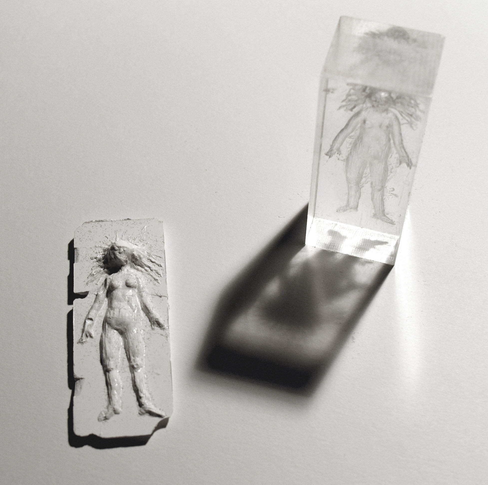   When I watched you turn yellow, I felt you leaving, and your love , 2020, Plaster, Plastic Resin, Shadow, light. Aprox. 6” dia. 
