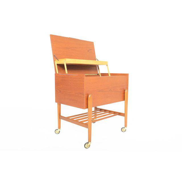 danish-modern-teak-sewing-box-with-exposed-legs-1935.jpeg