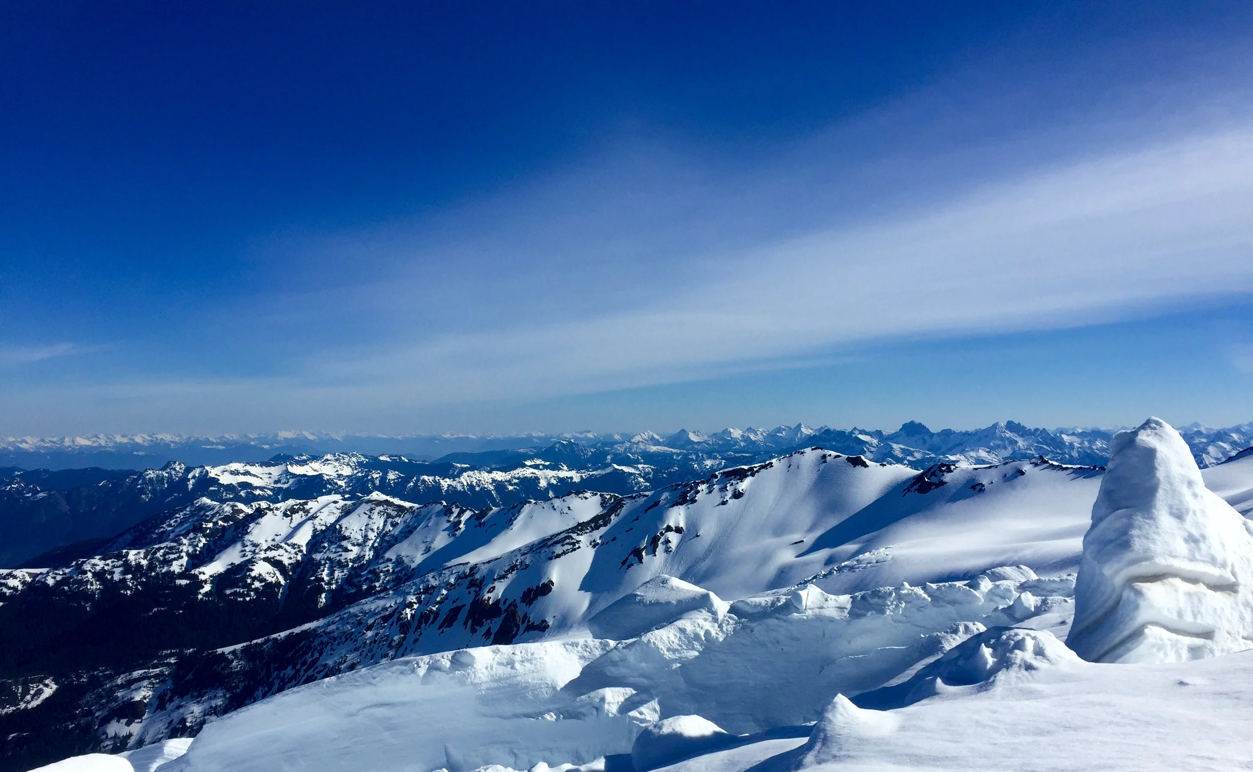 A view from the peak of Mt. Baker: about 10,700 feet/3,200 meters above sea level. I took a nap on my backpack when we got there. 