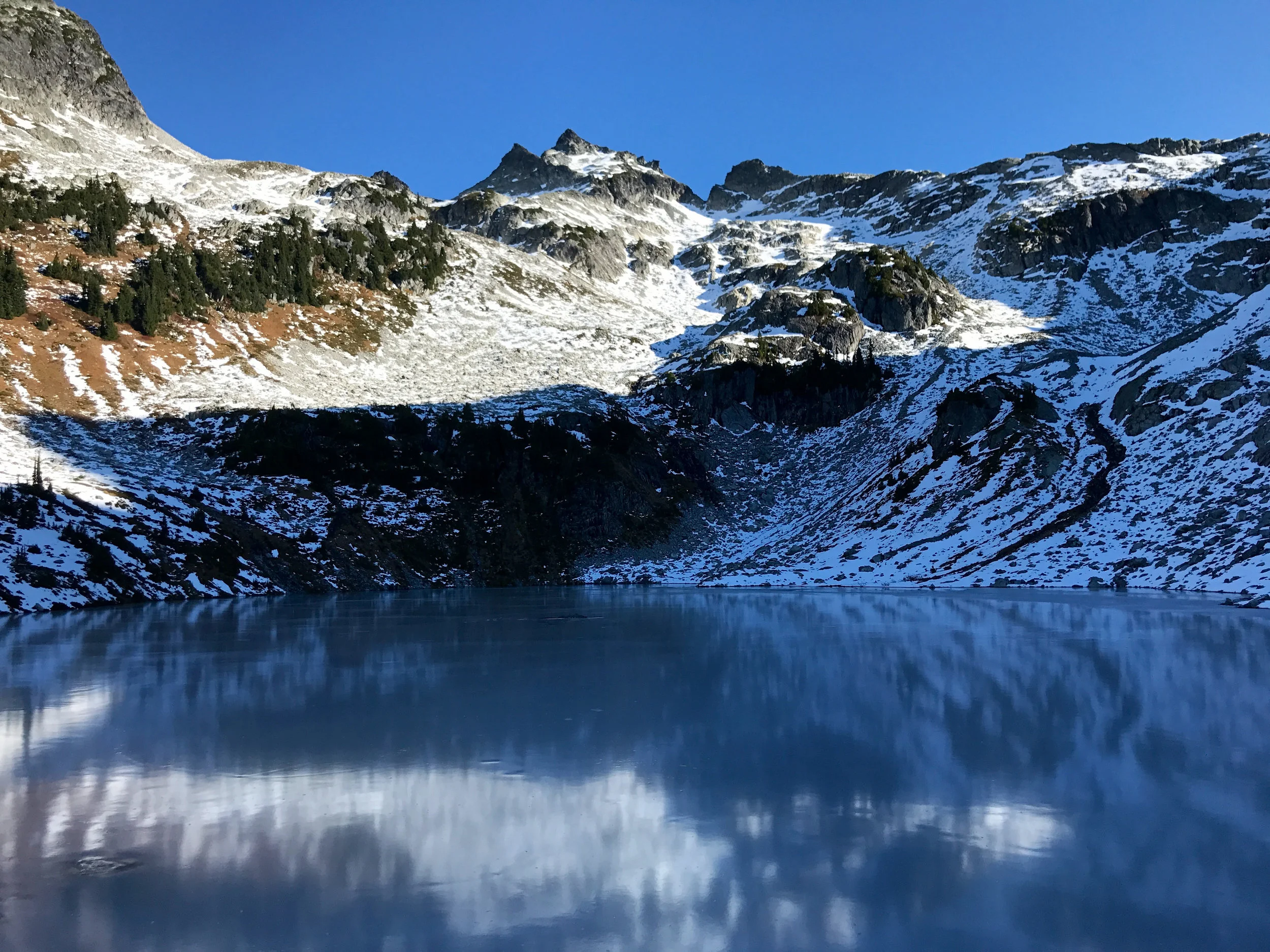 Looking up at the peak across a frozen lake. This was a couple of hours into the hike. 