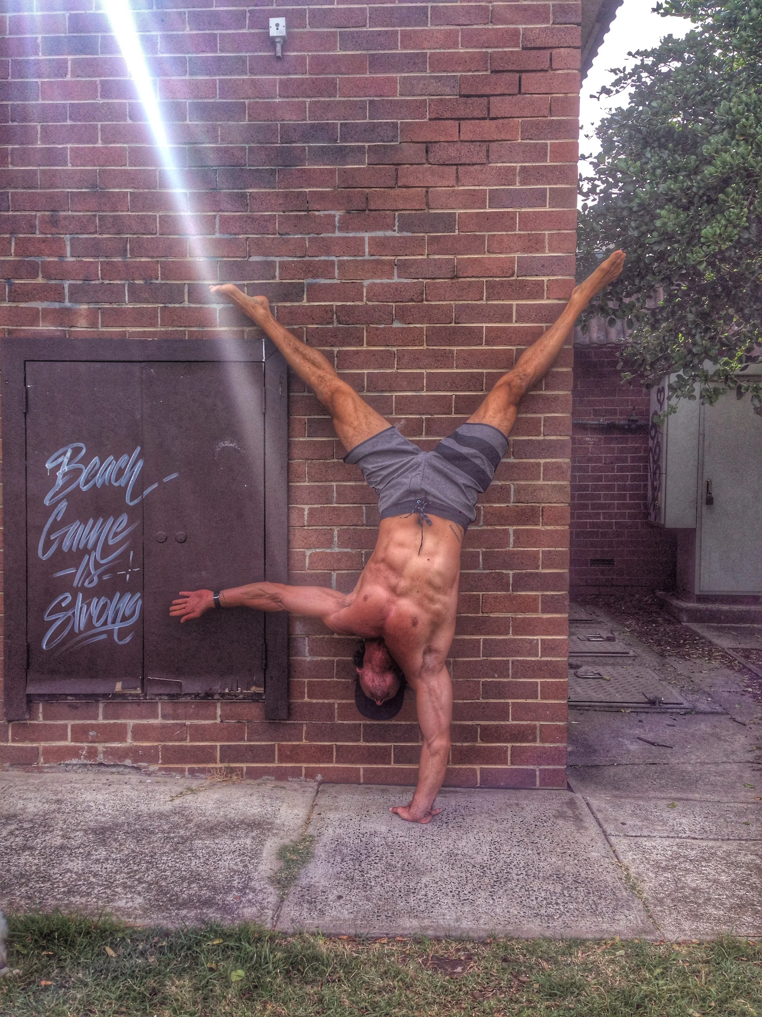 Single arm handstand