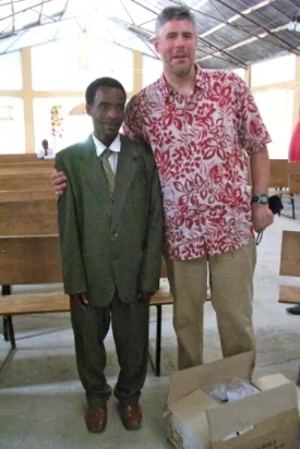 Pastor Iladore pictured on left