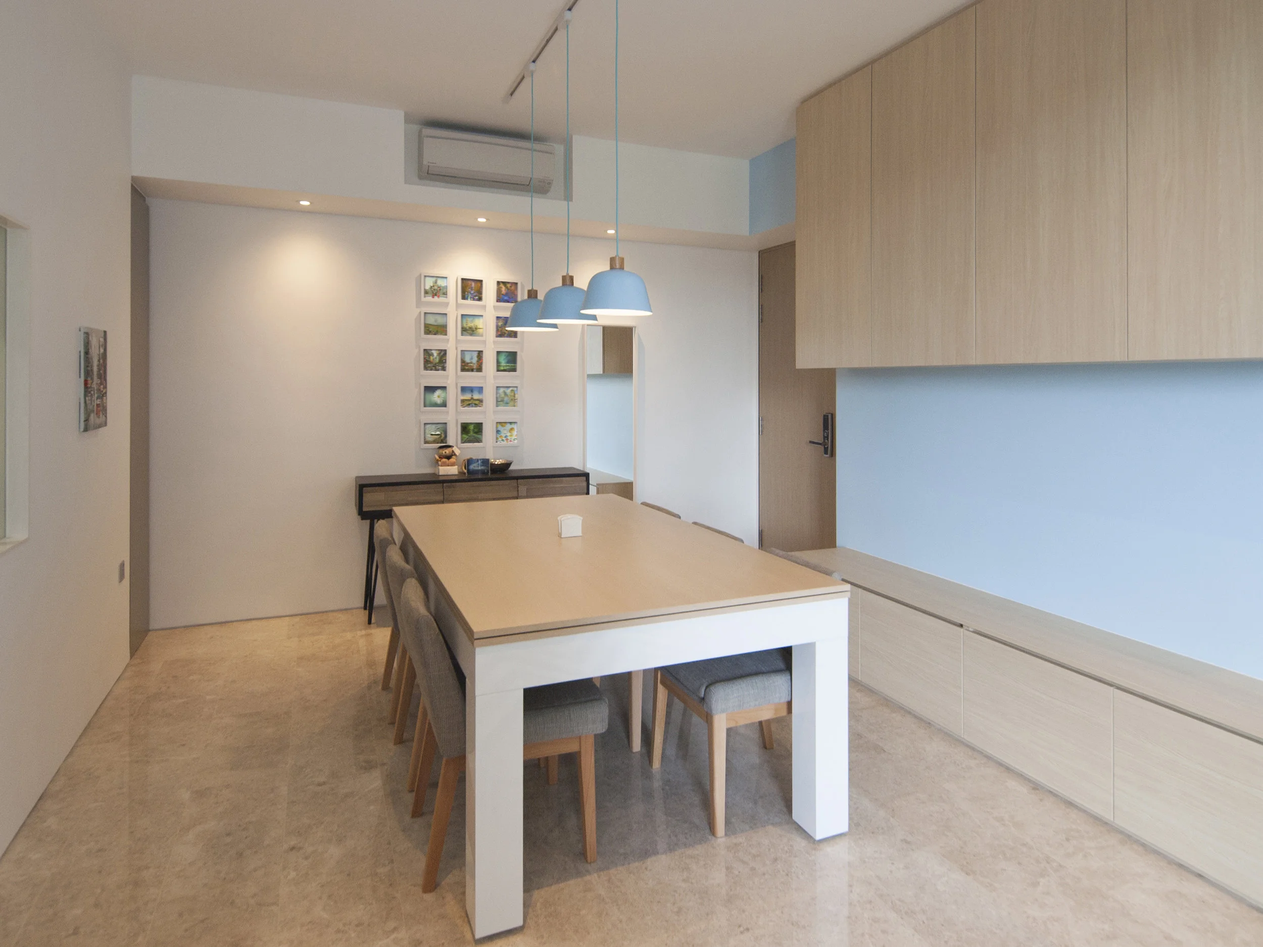 2-in-1 Dining and Pool Table. The storage cabinets are positioned such that they do not obstruct the pool cues while playing. The low cabinet also doubles up as seats when a game is in play. 