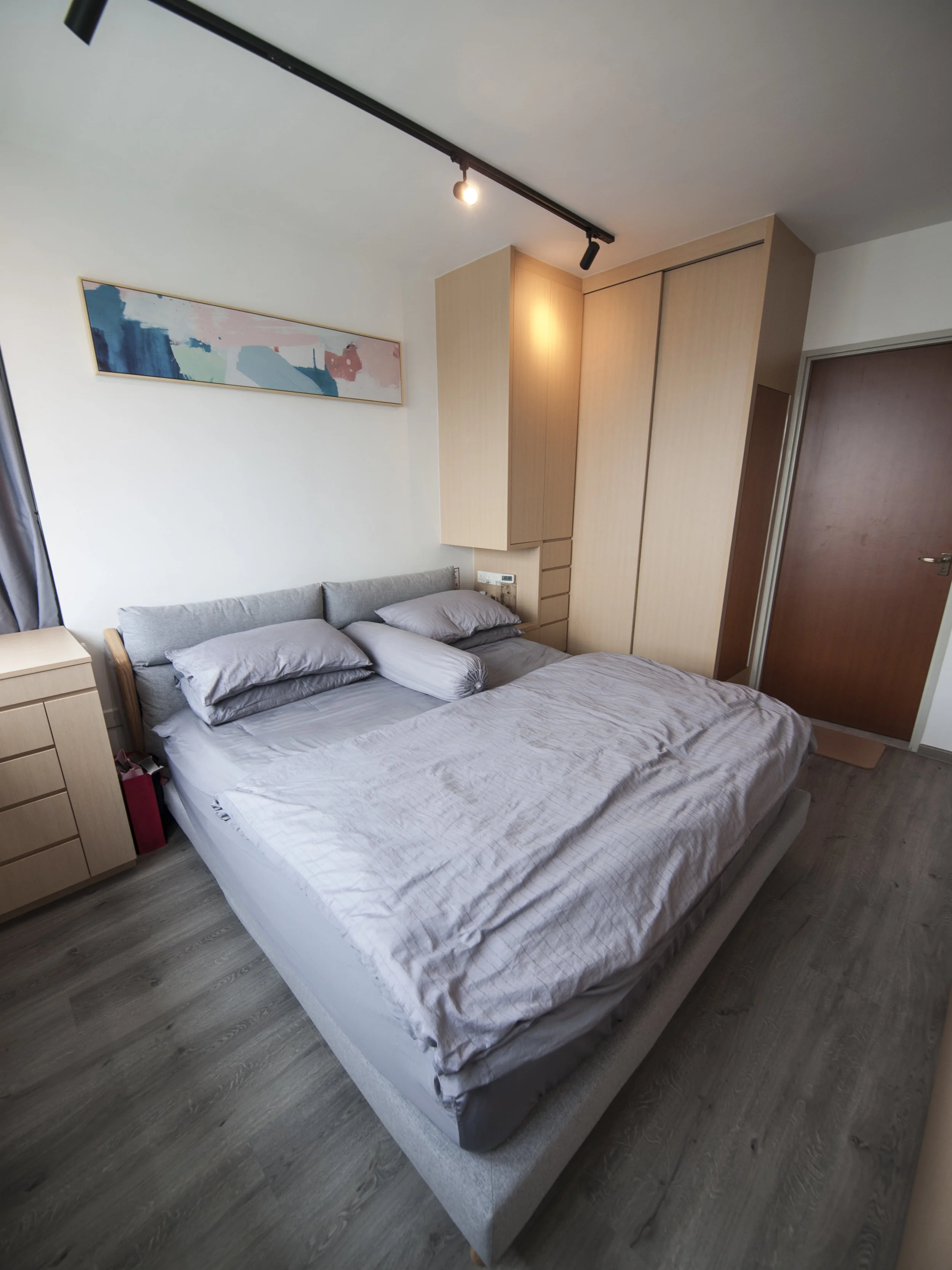Master Bedroom with a wardrobe, and a dresser next to the windows.