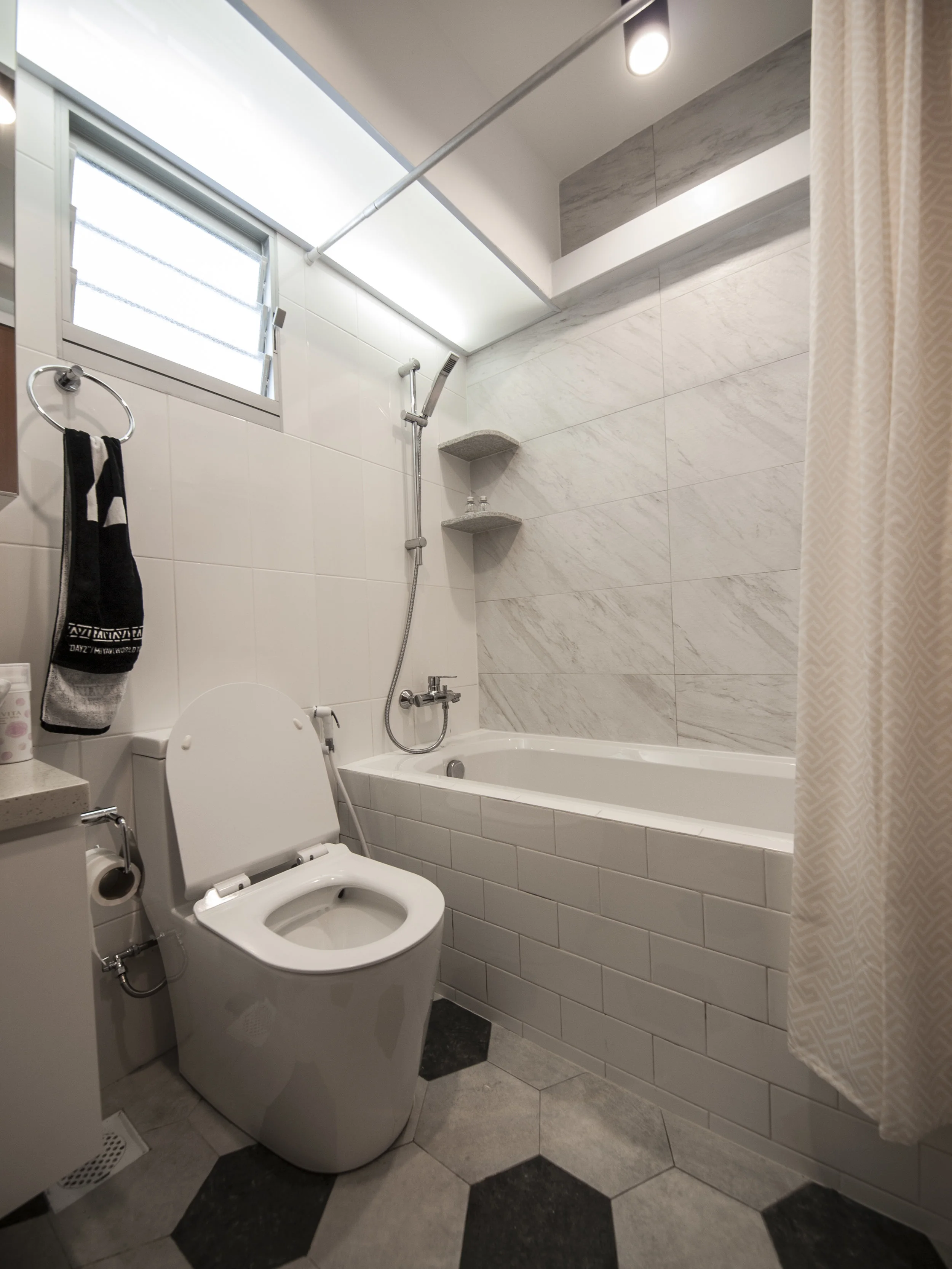 Master Bathroom with a fitted bathtub.