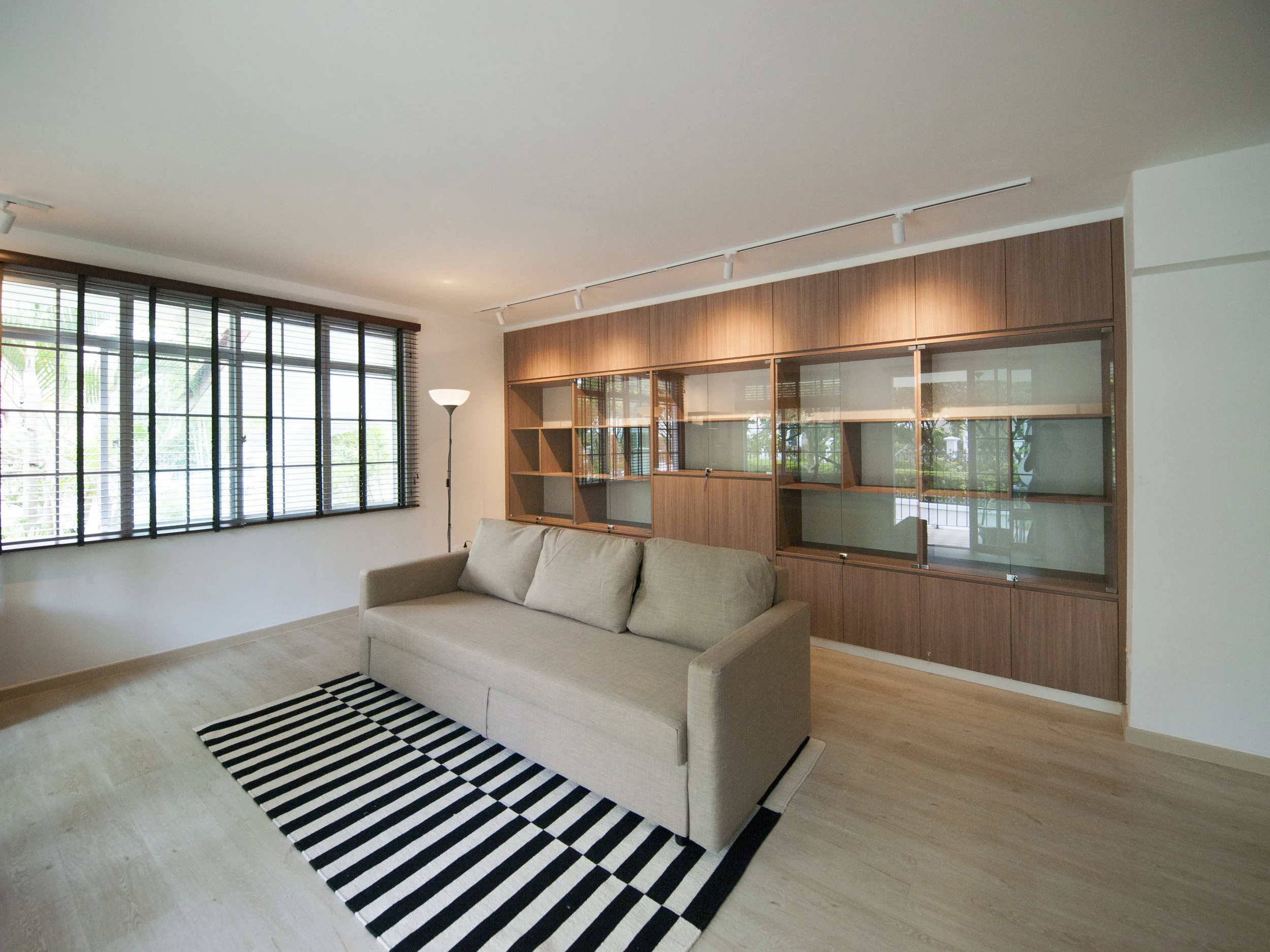 A spacious family lounge with ample space for their prized collection.