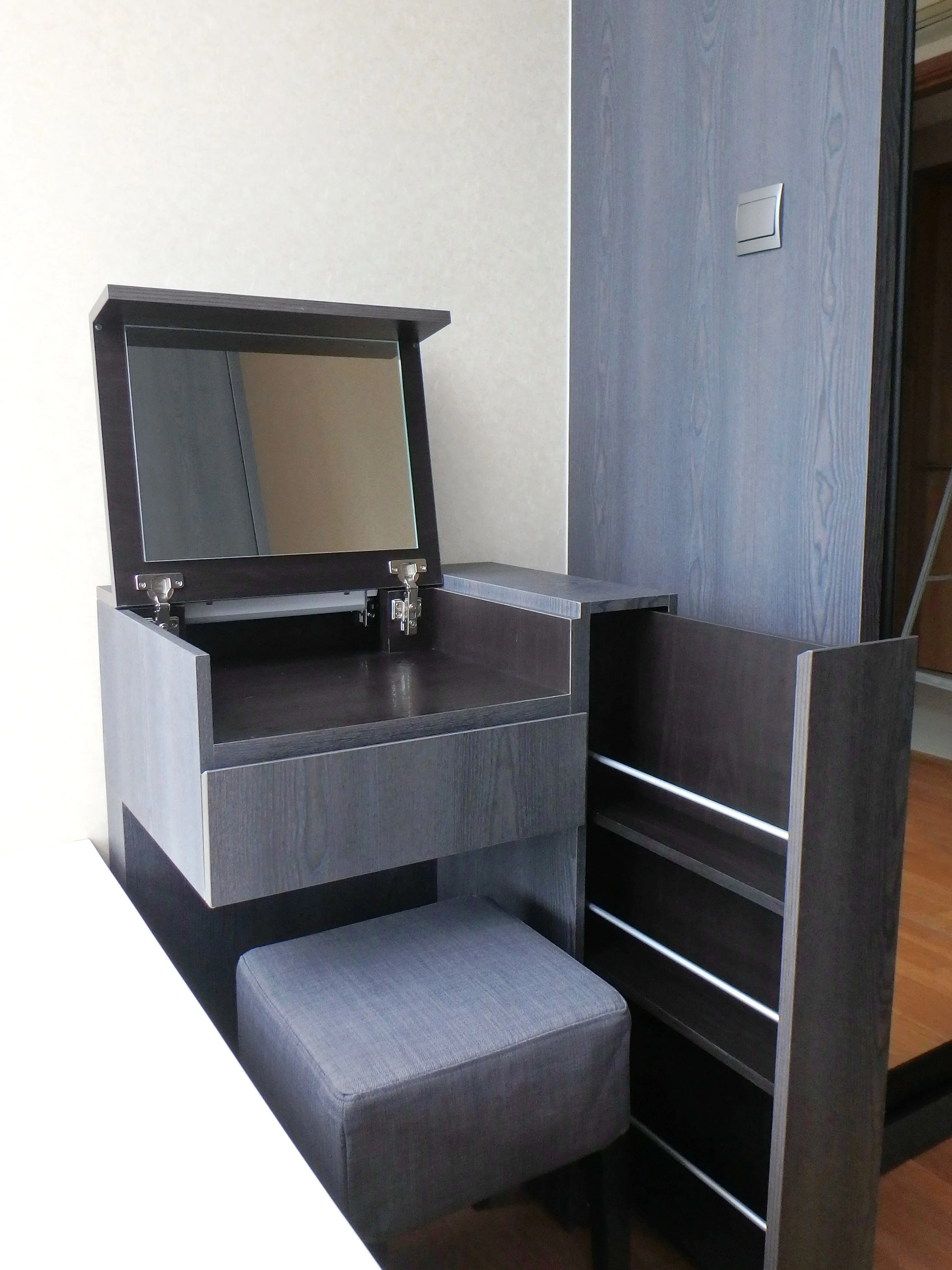 HERS Not your ordinary dresser. Apart from a drawer and tabletop storage, this compact dresser has ample space for tall bottles of perfume and cosmetics