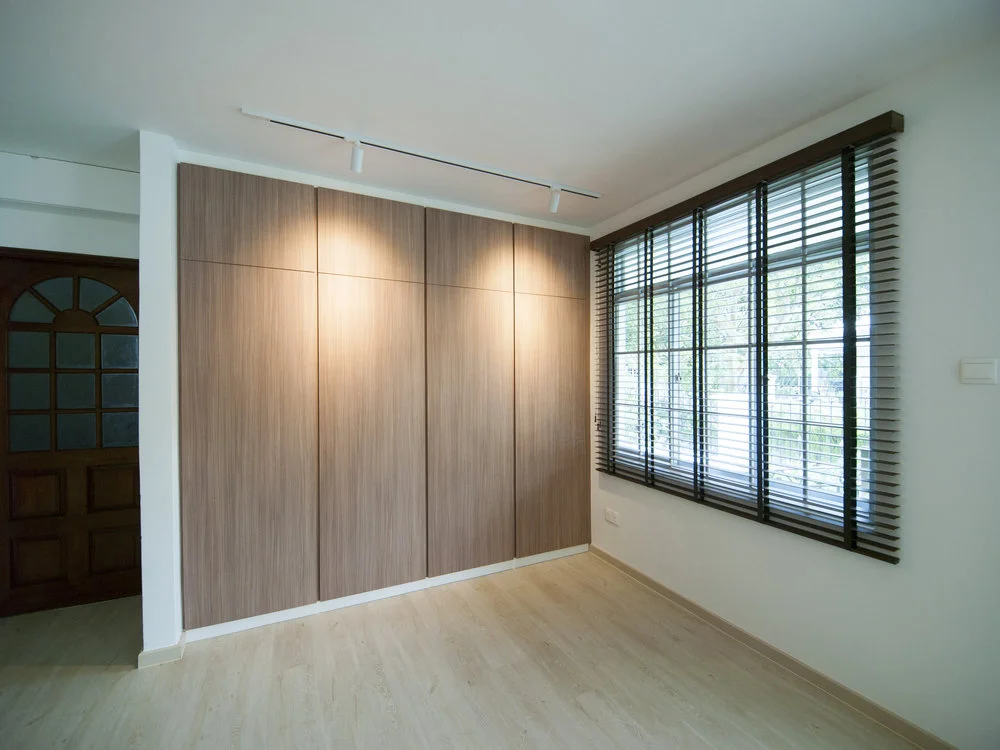 The family lounge doubles up as a guest room, with ample wardrobe space for guests.