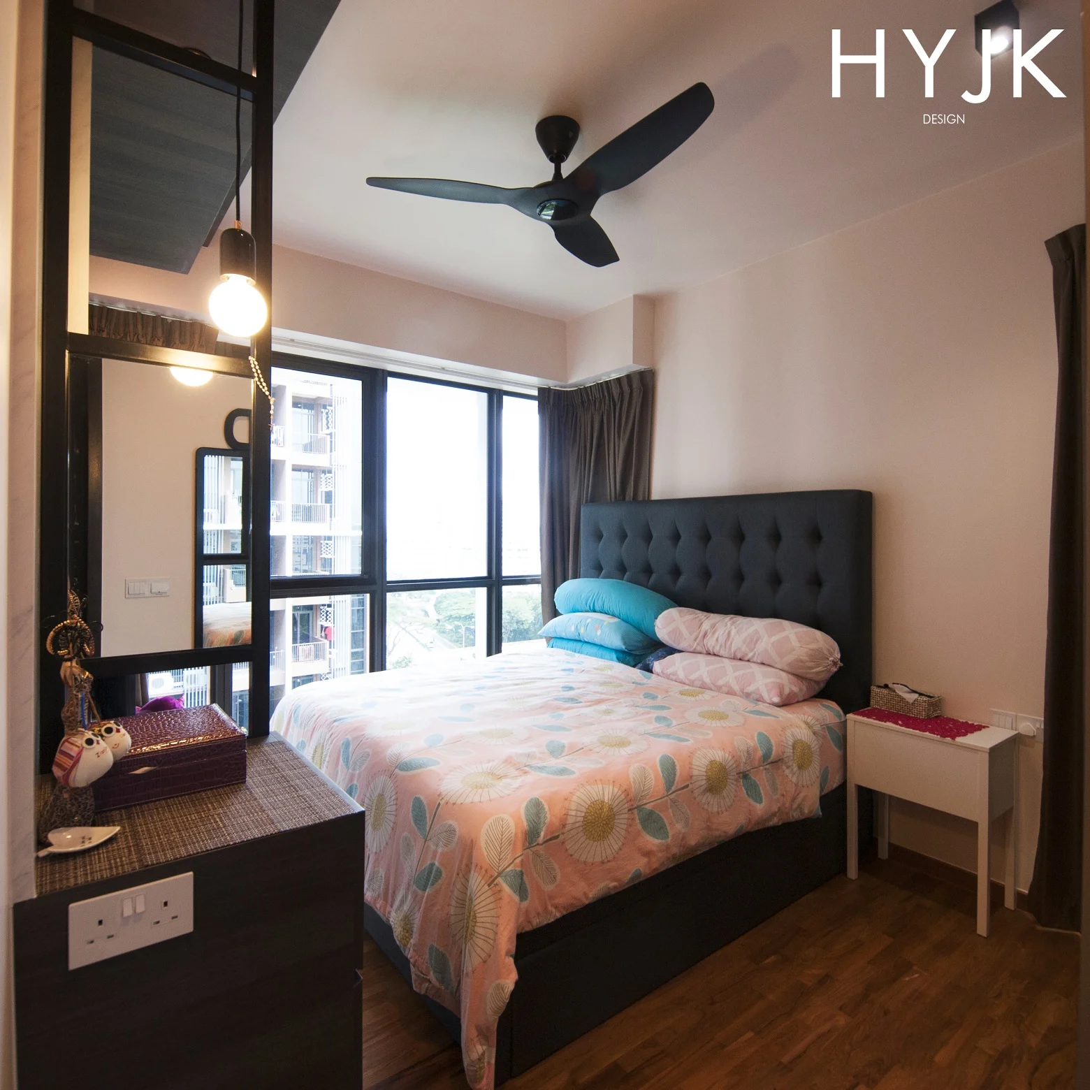 Mirror mounted on a steel ladder to face away from the bed. The steel ladder doubles up as a decorative piece which divides the dresser from the TV console. (Project Oasis)