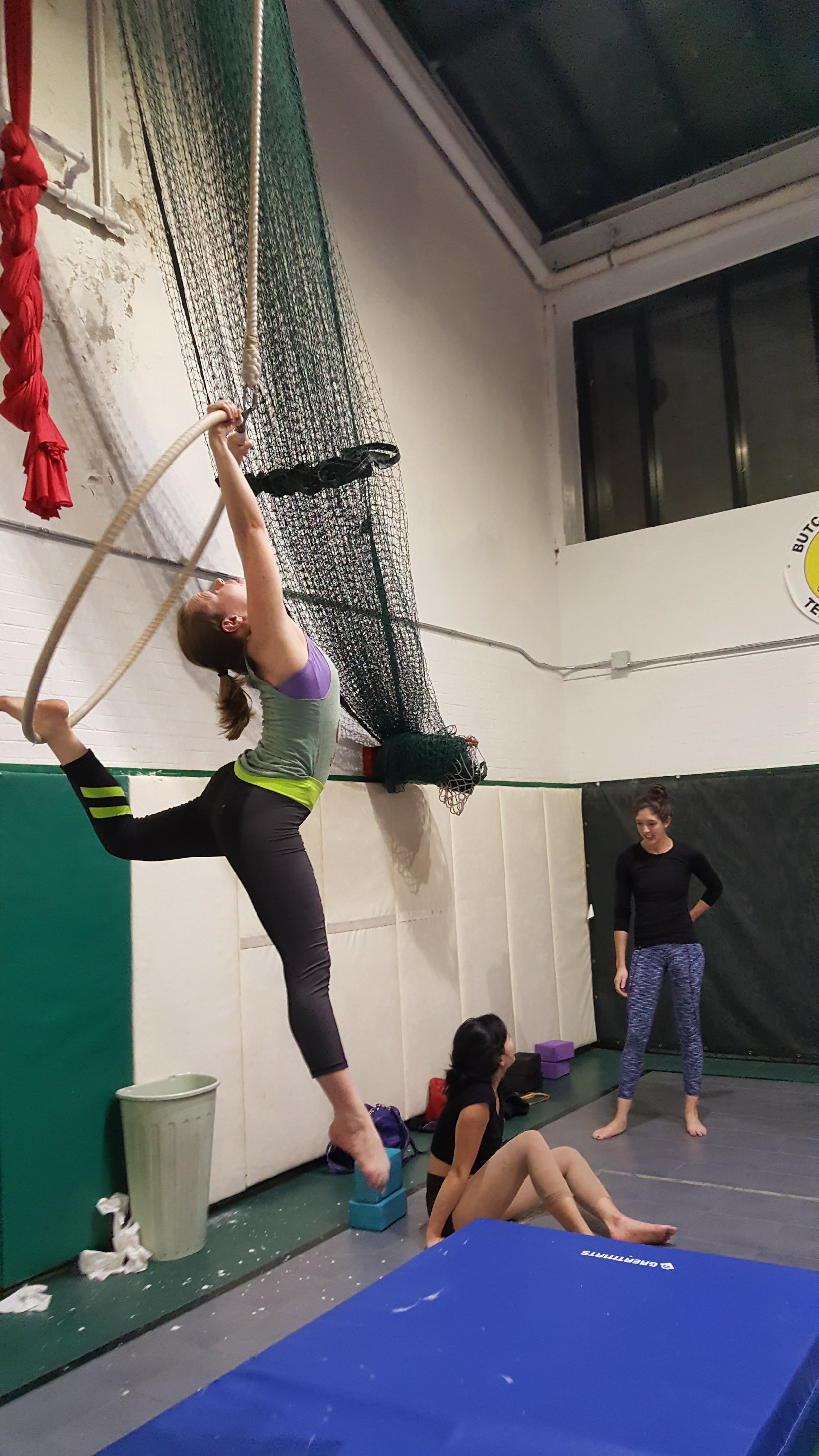 Brittany spins on an aerial hoop...even though her spotting isn't as good as it once was, she's still crushing it.