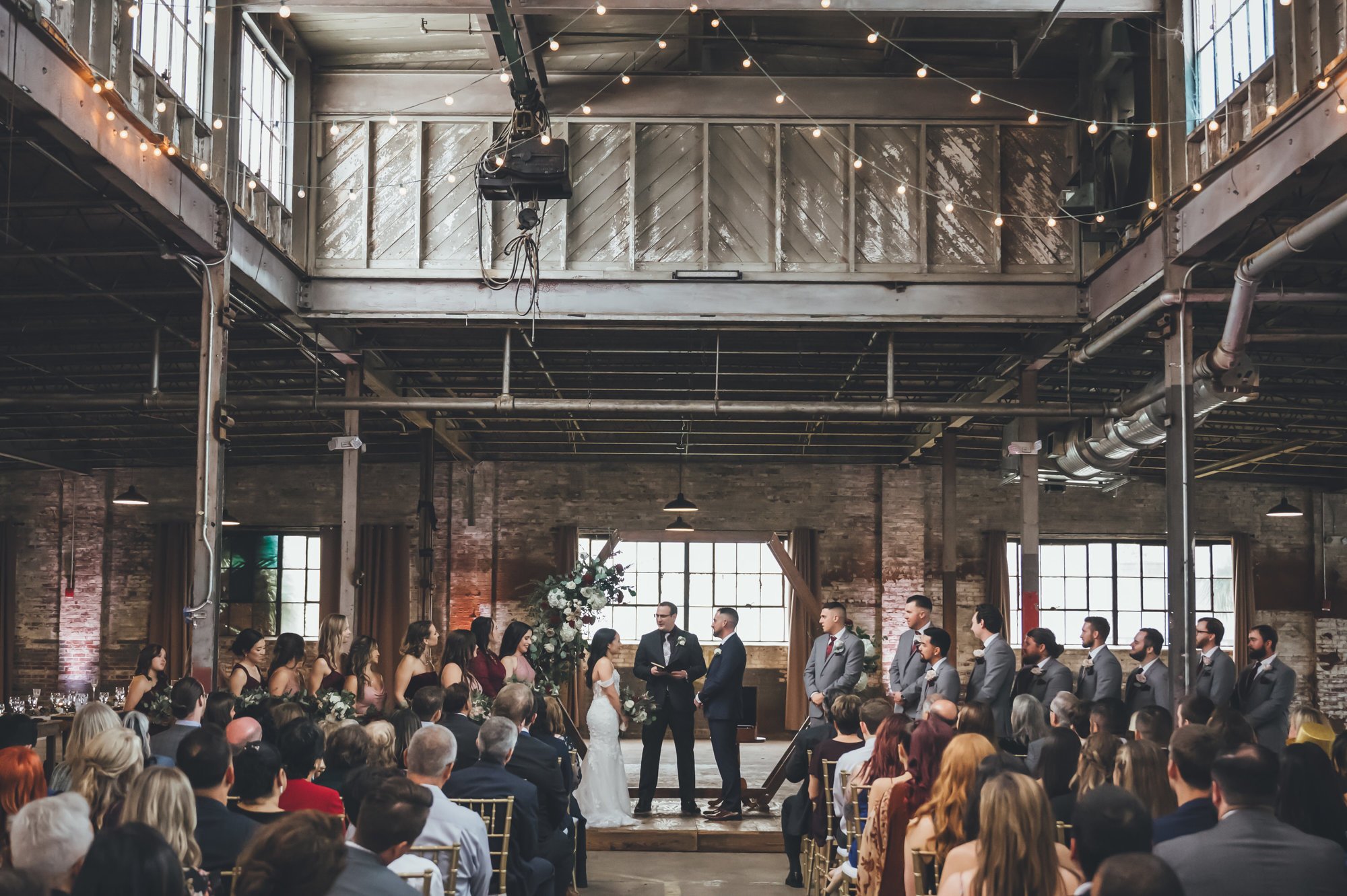 Industrial wedding ceremony at The Glass Factory in Jacksonville, Florida captured by Bow Tie Photo & Video.jpg