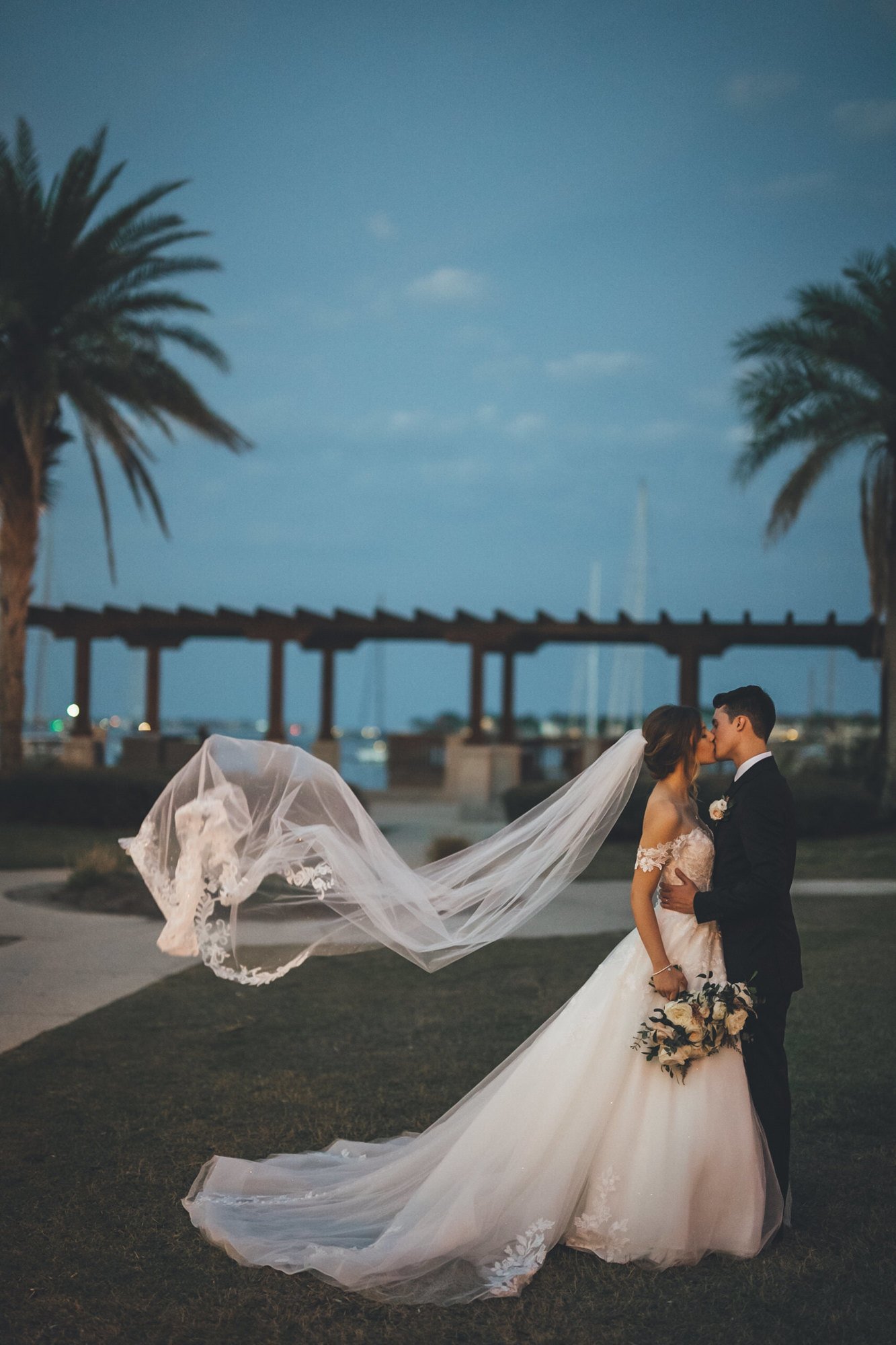 Bow Tie Photo & Video couple with bridal portraits at sunset at Treasury on the Plaza in St. Augustine, FL.jpg