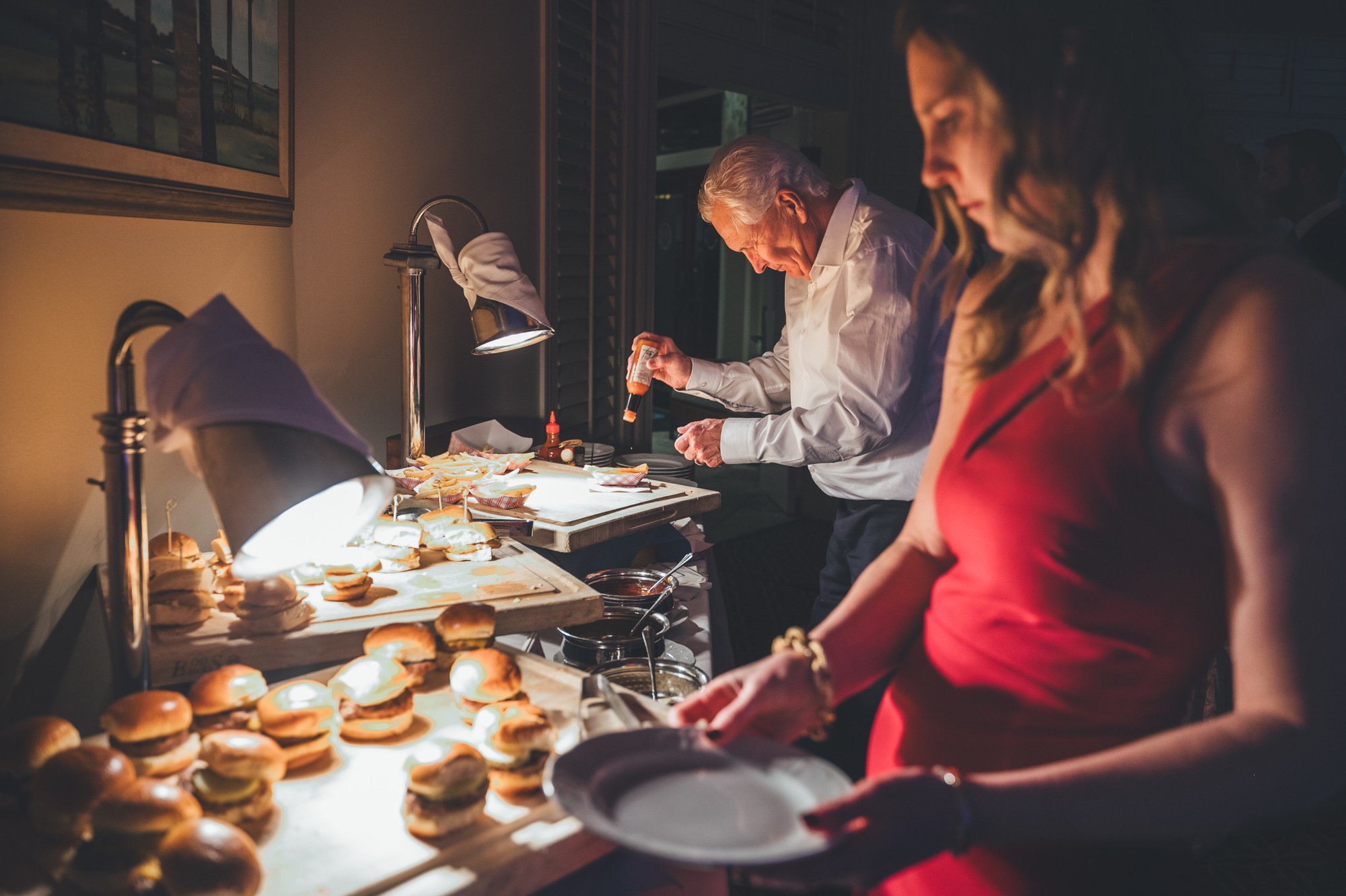 Bow Tie Photo & Video couple's late night munchies at wedding reception in Florida.jpg