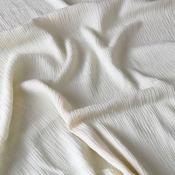 RAYON | The generic name for a man-made fibre derived from cellulose, that can be manufactured to have the basic characteristics of cotton or silk. Viscose and Cuprammonium are two common rayons.