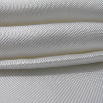TWILL | A weave giving the effect of diagonal lines on the face of the cloth.