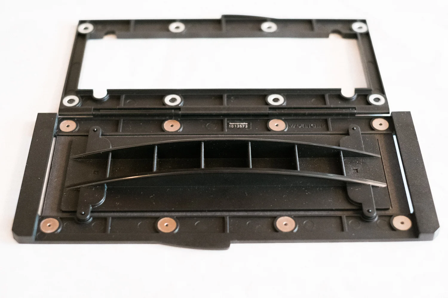 A magnet cover will prevent film from curling.