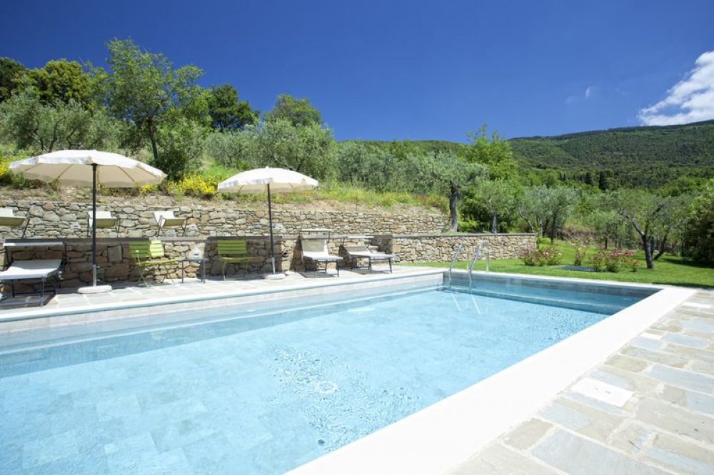 cortona-villa-pool-lounges.jpg