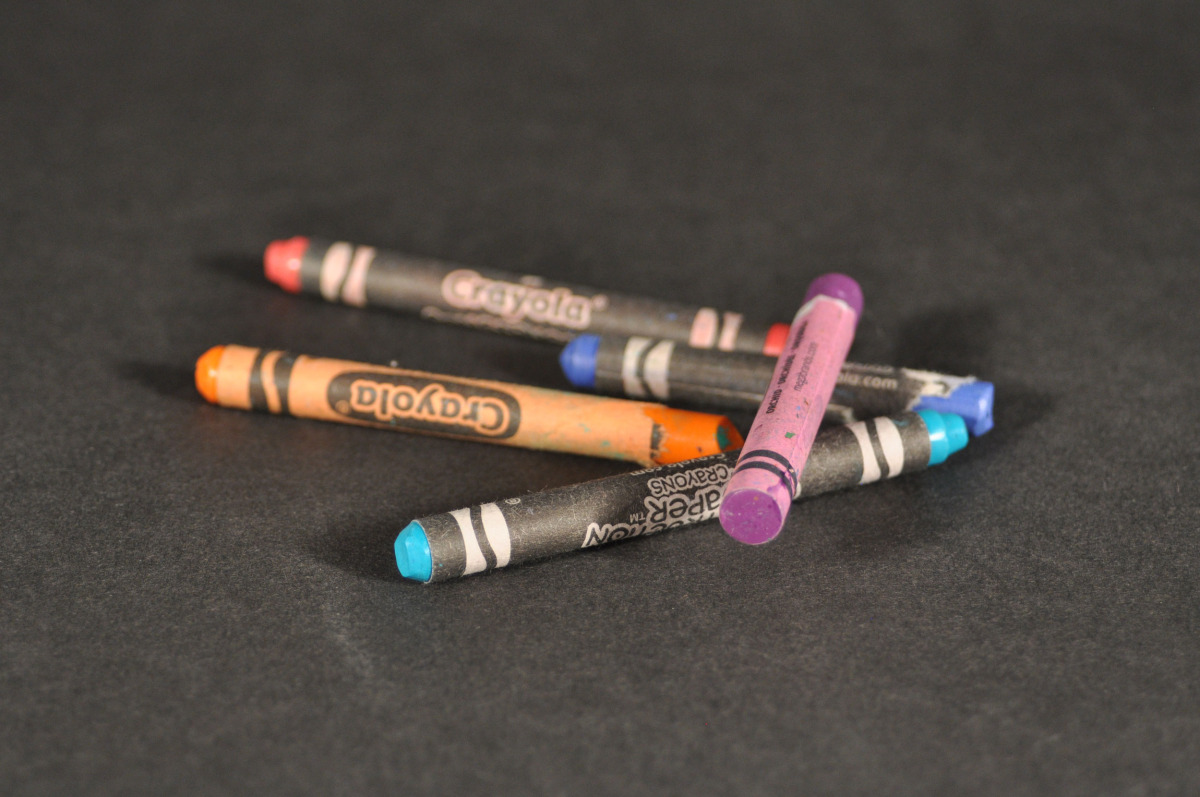 Crayons representing a time when "I didn't have to consider the mantra of living in the moment then because it was the only way I knew how to exist"; representing Self Actualization.