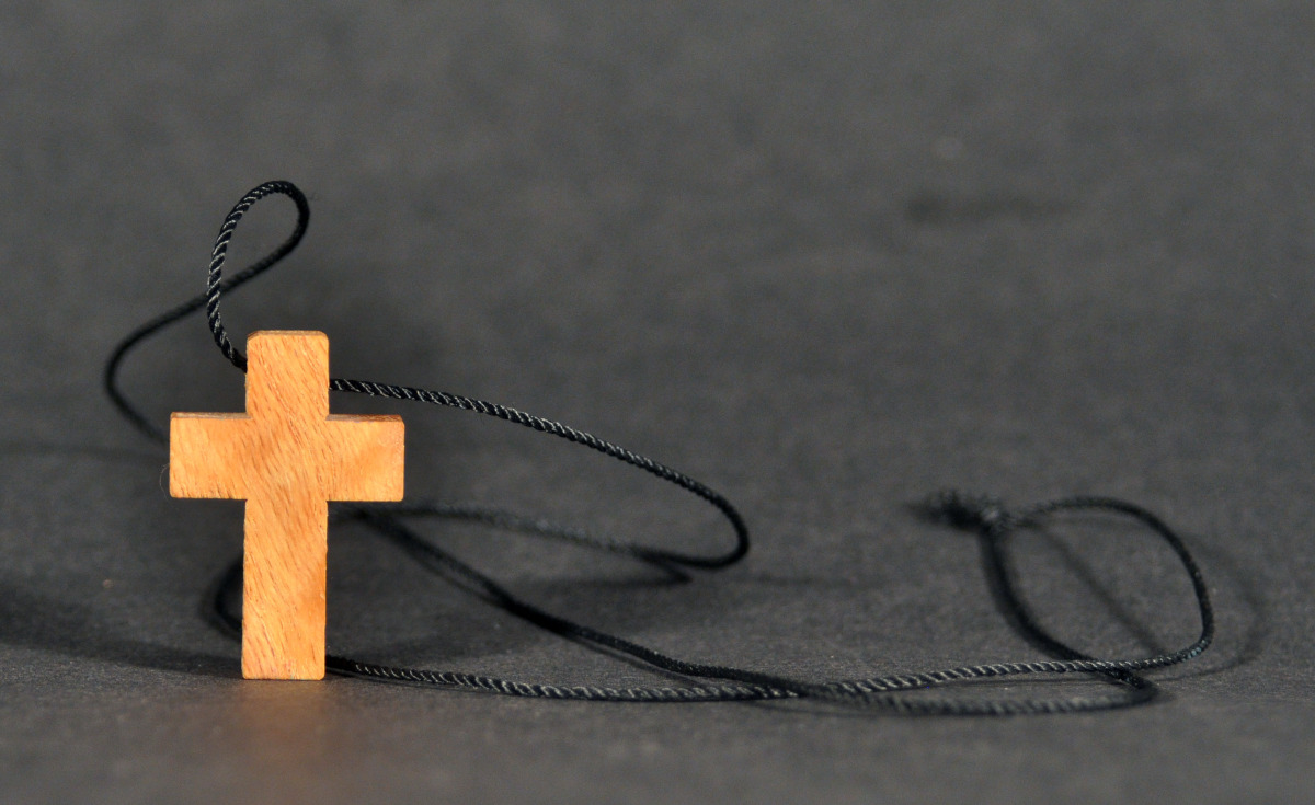 A cross representing Self Actualization.